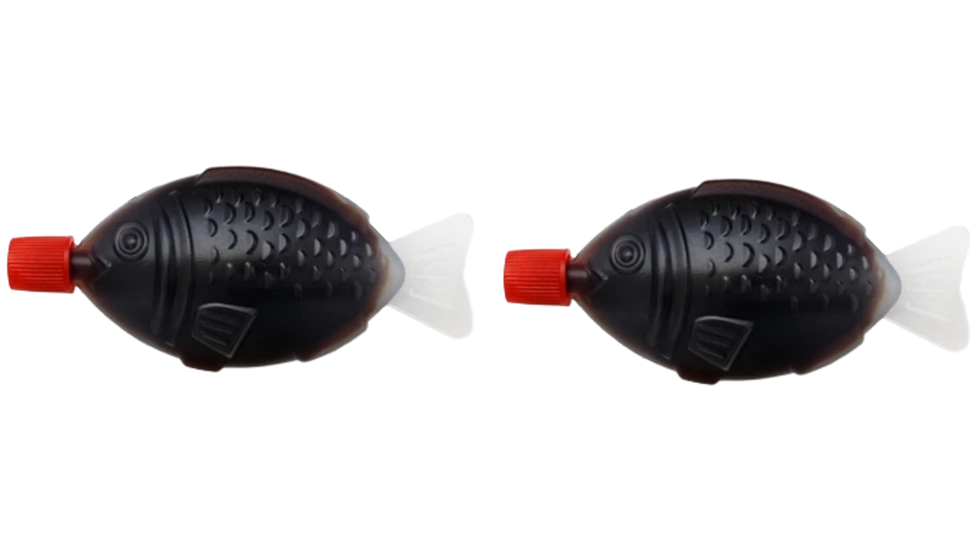 Two toy fish-shaped bottles with black bodies, white tails, and red caps