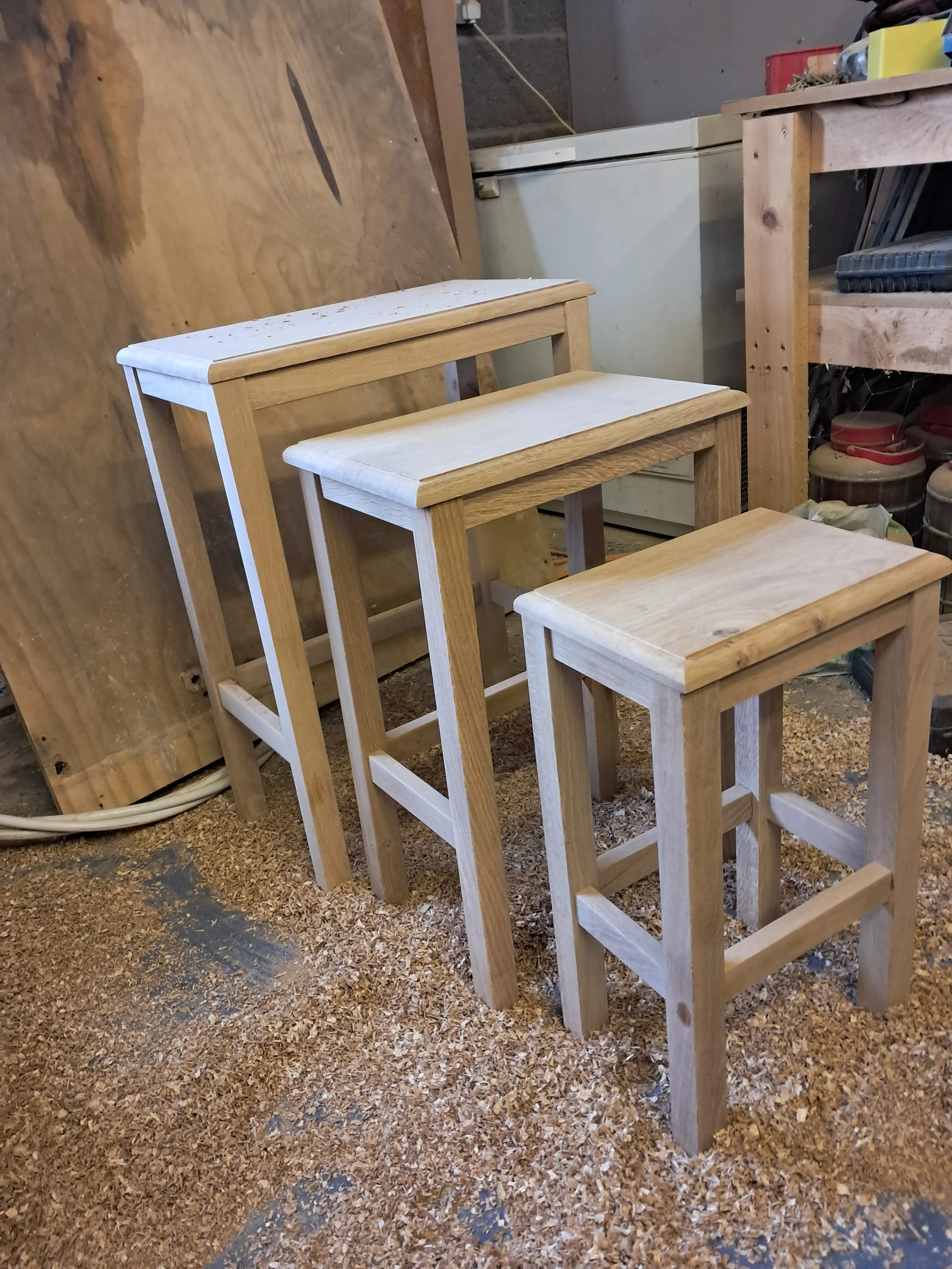 Three solid oak nesting tables