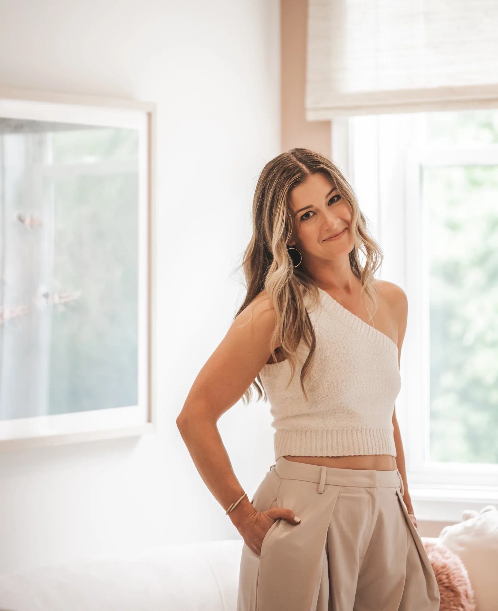 Marissa Mihos founder of Revival Wellness Studio smiling
