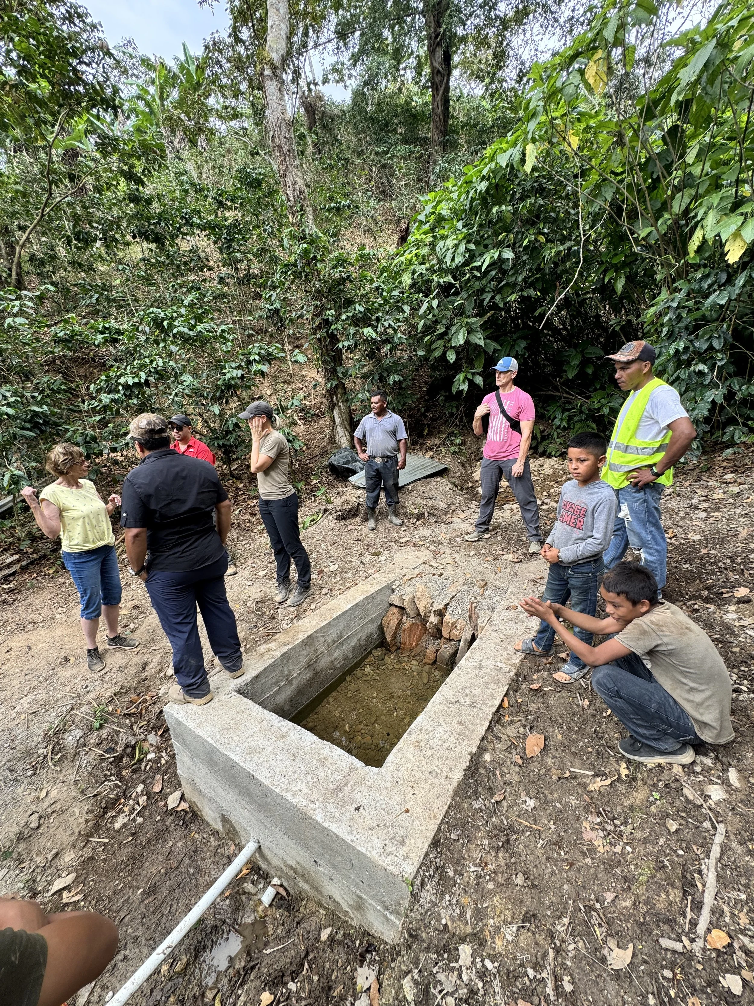 This is the new natural filter that the villagers built.  There was no filter in place before this, and the water source was easily contaminated by animals living in the surrounding trees.  