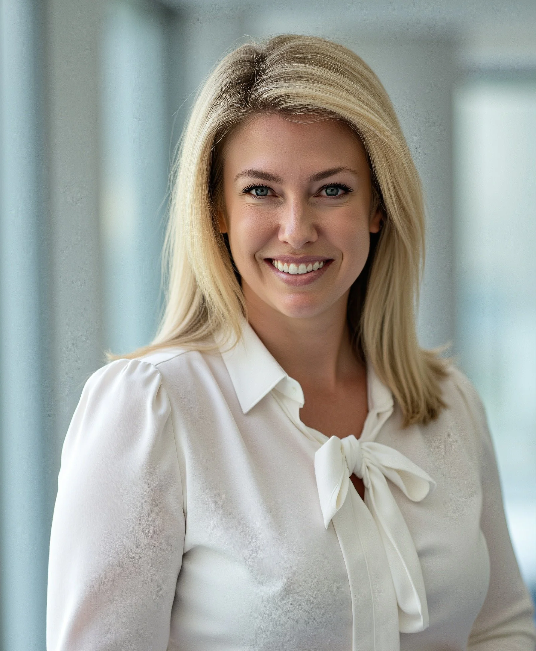 Professional headshot of Denise Bowen, Founder of ThreeBetter, in executive business attire.