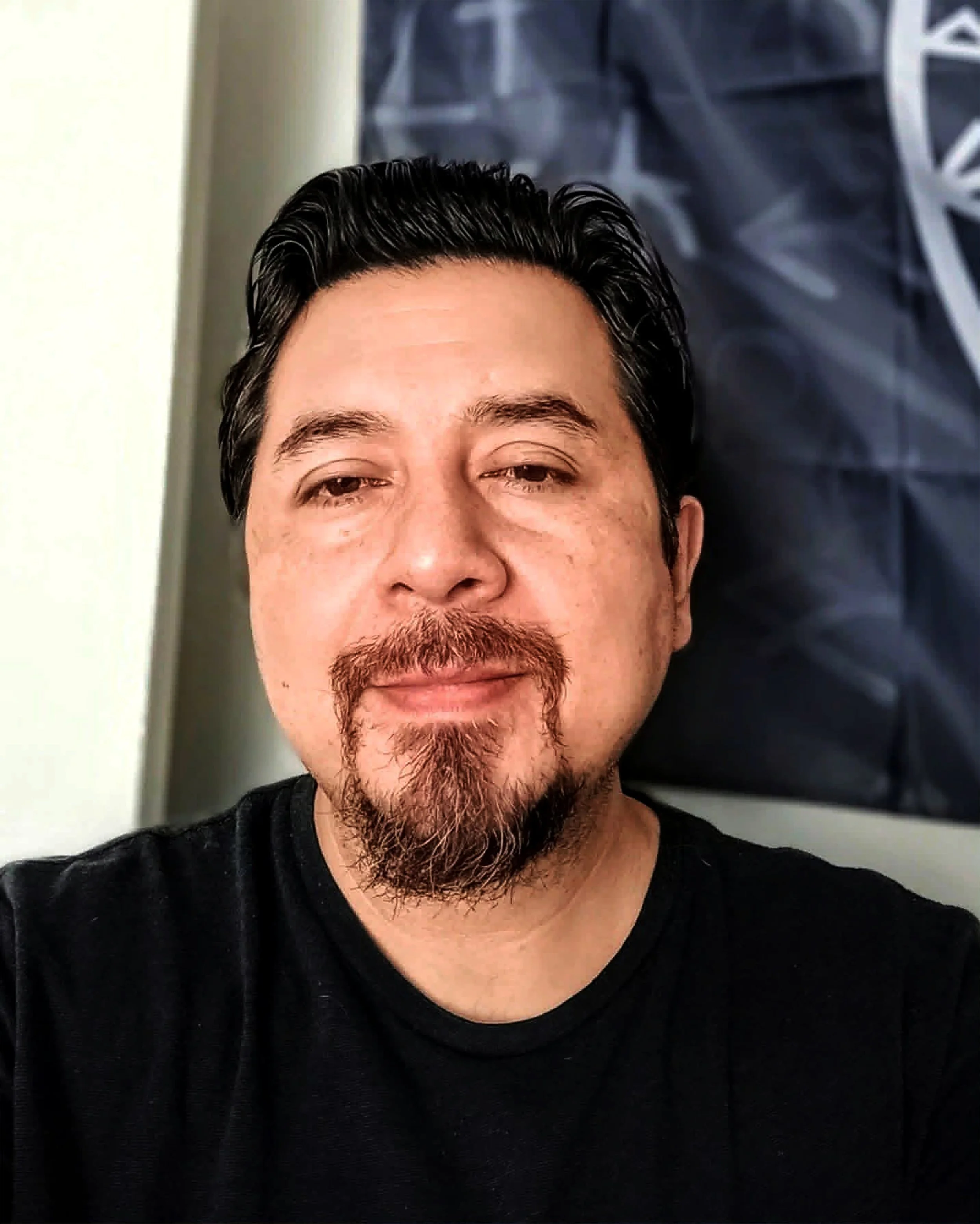 image of an adult with a goatee
