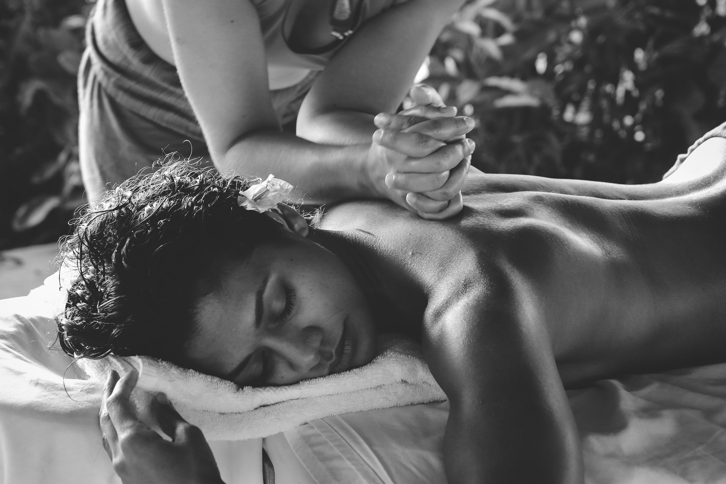 Praeva providing therapeutic massage at Silent Flow Boutique Spa in Brookshire, Texas.