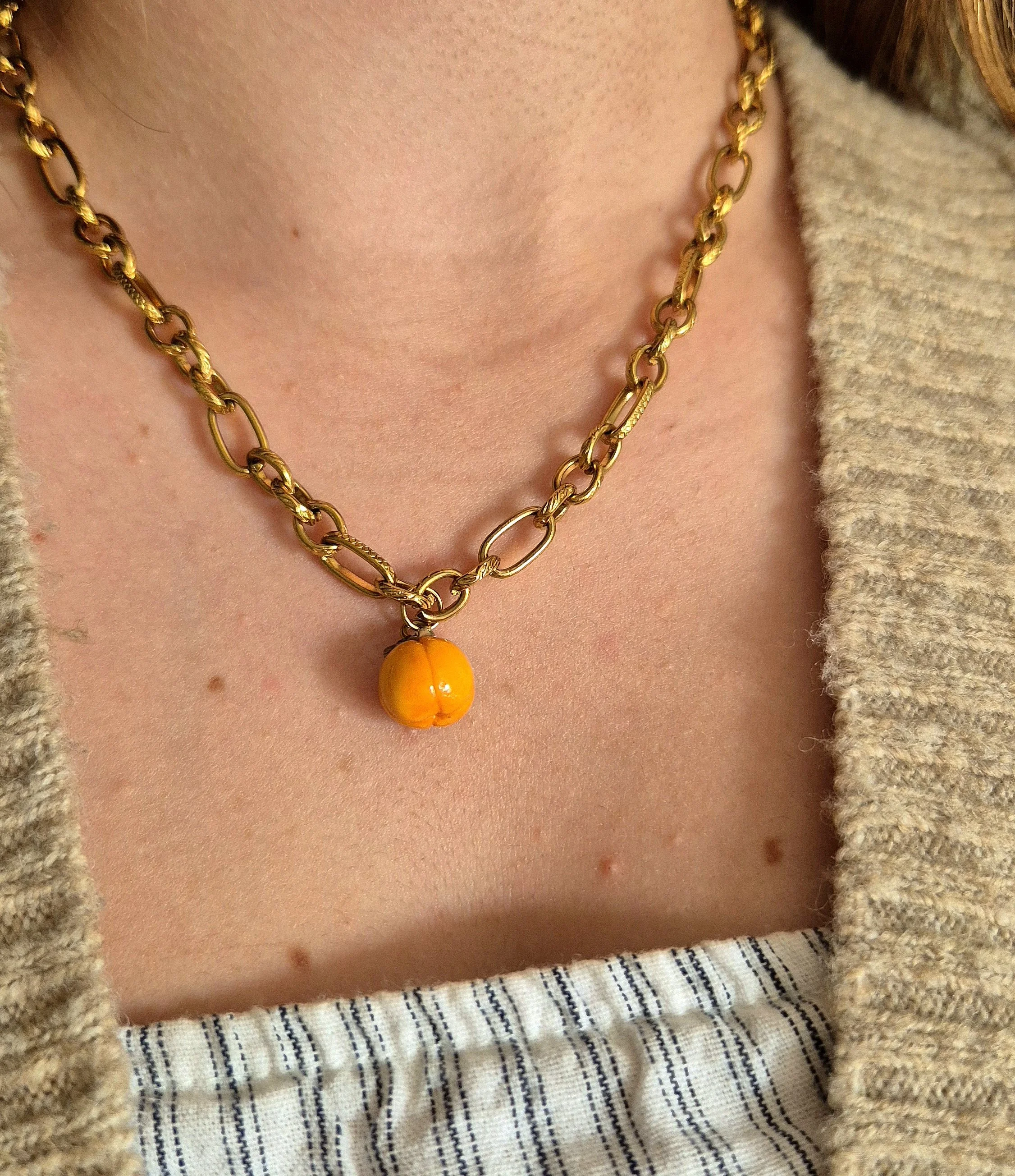 The persimmon necklace