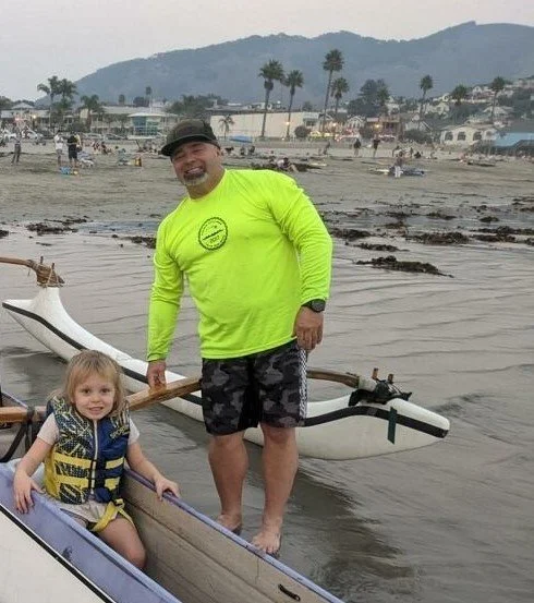 PKO Head Coach Scott Bixler coaching outrigger paddlers on the Central Coast