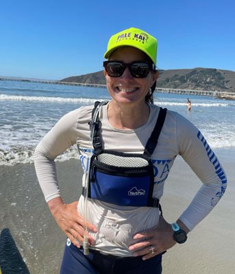 PKO Women's Coach Sarah Sandstrome coaching outrigger paddlers on the Central Coast