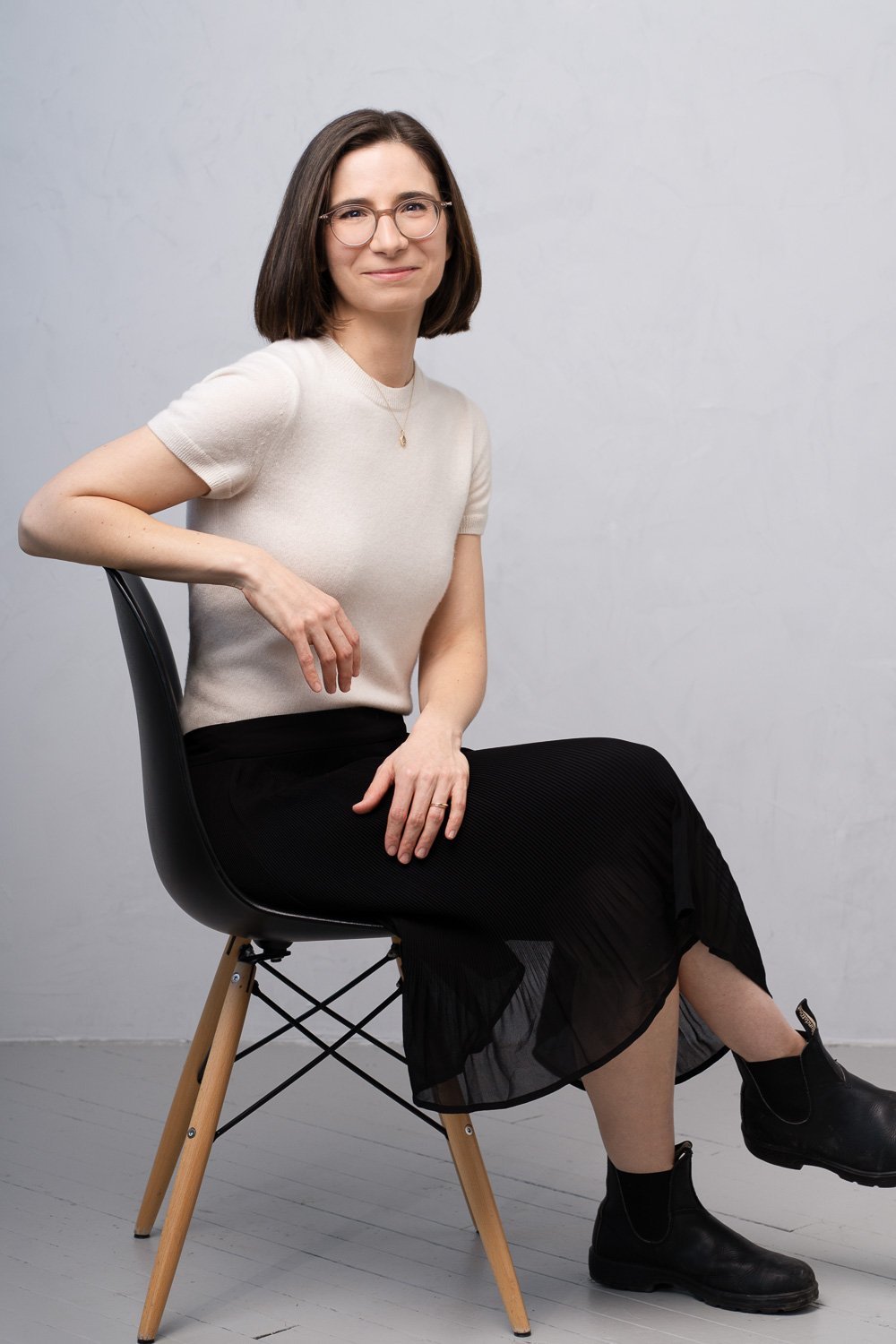 photo of young professional in studio on chair