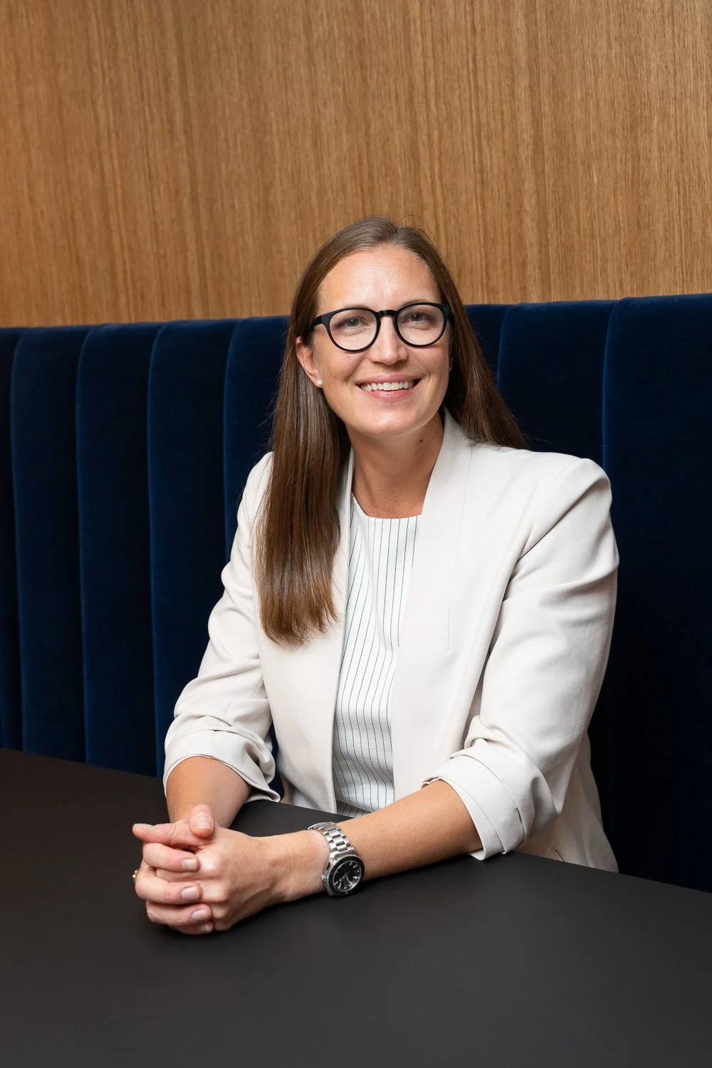 profile image of woman associate in midtown offices
