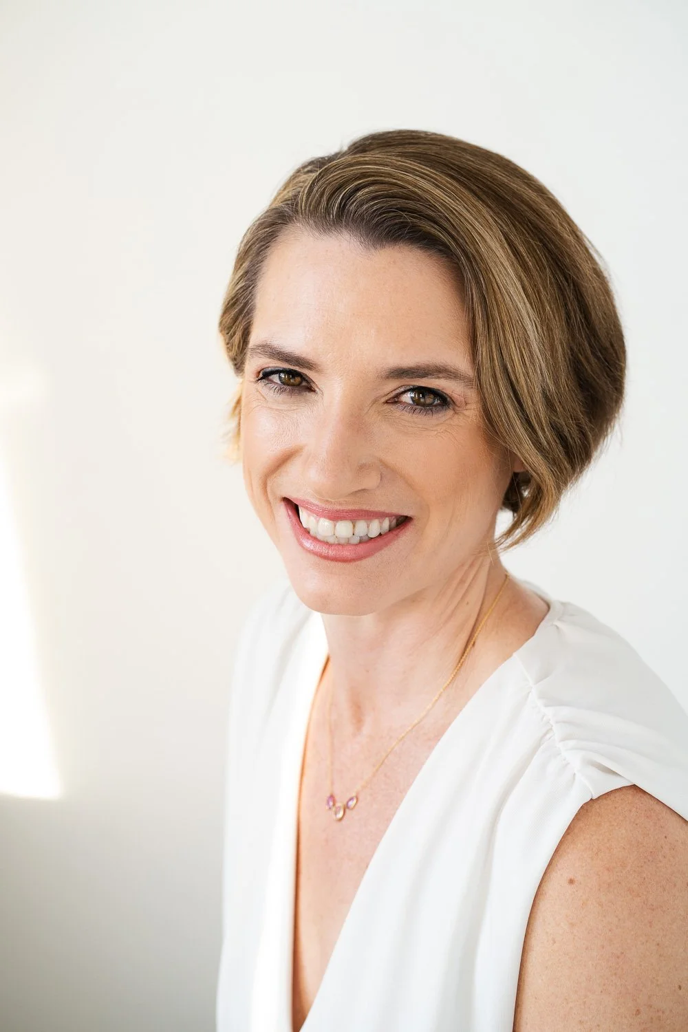 headshot of professor and writer in Brooklyn studio