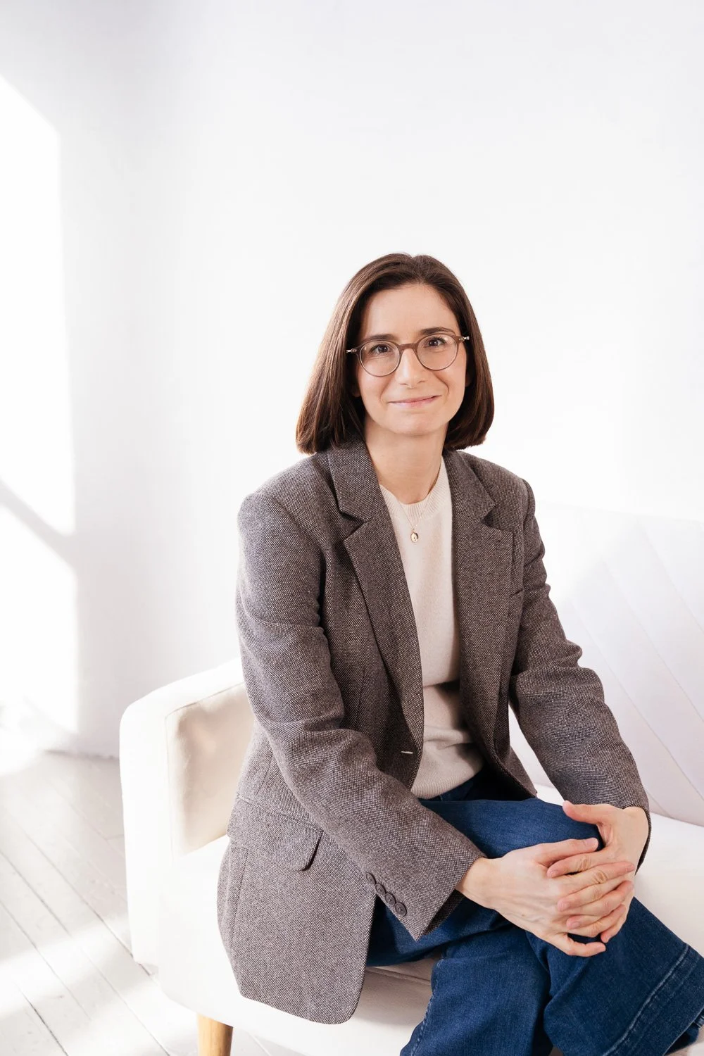 woman in casual business attire for headshot in studio