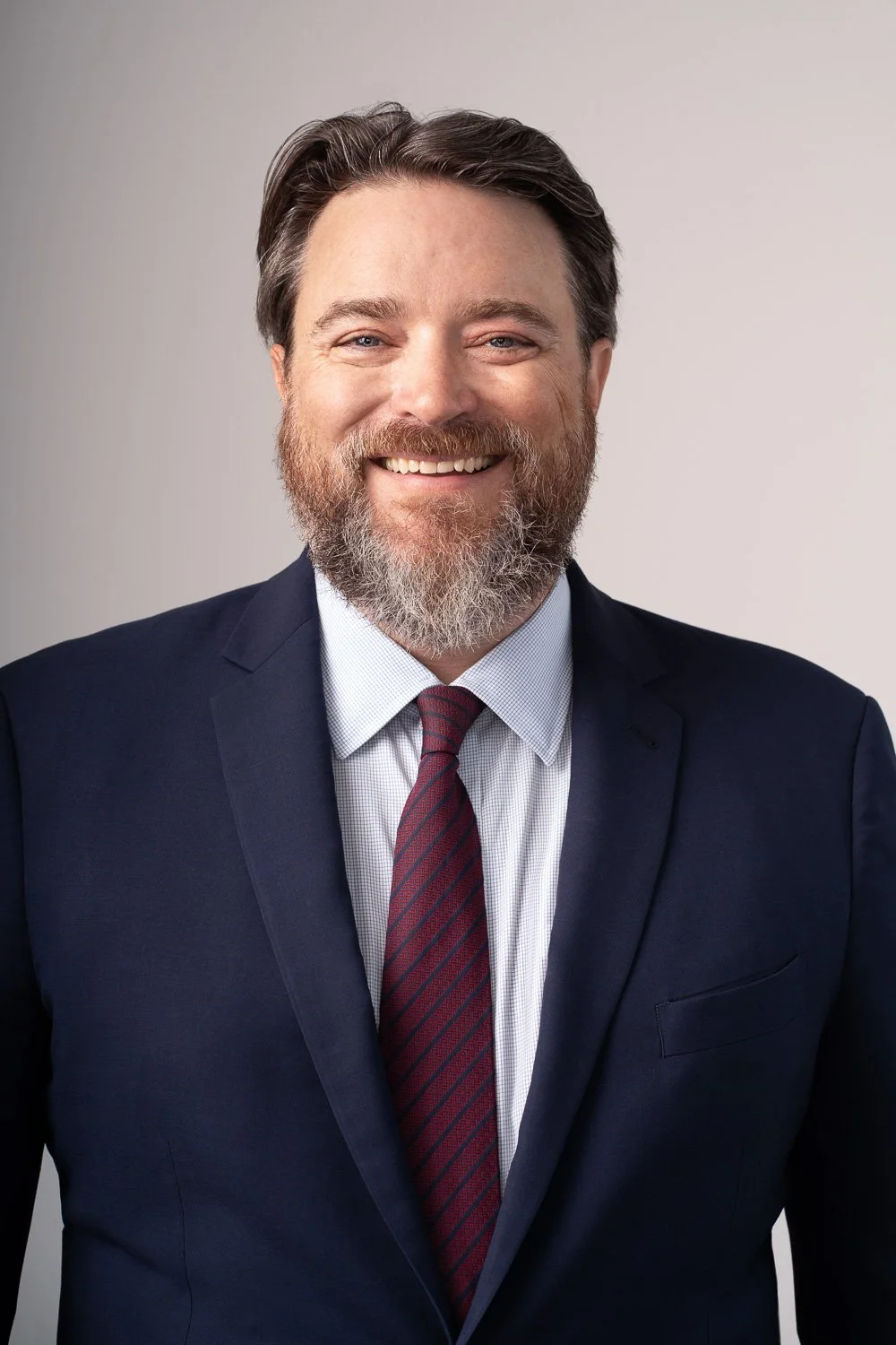 insurance executive headshot in suit