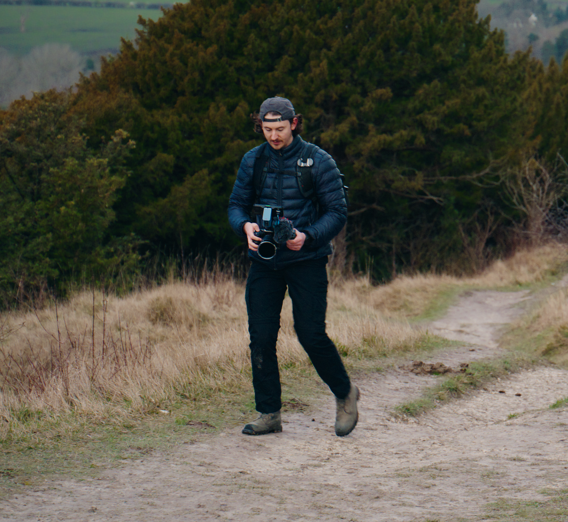 Ben Newman, Director and Cinematographer, filming on location in the Surrey Hills