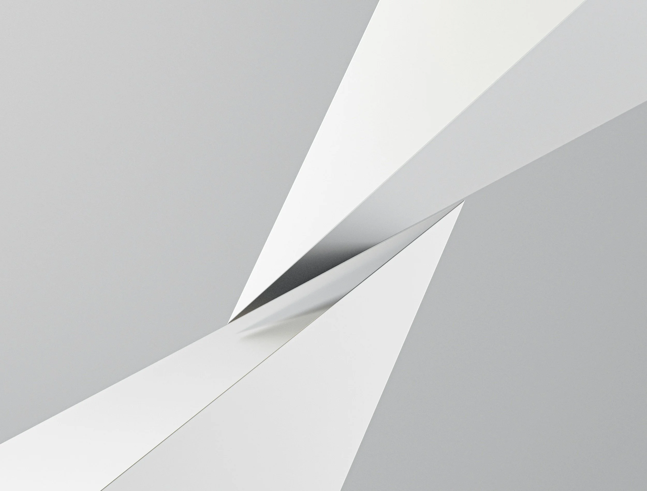 Close-up of white and gray paper sheets with a modern aesthetic design.