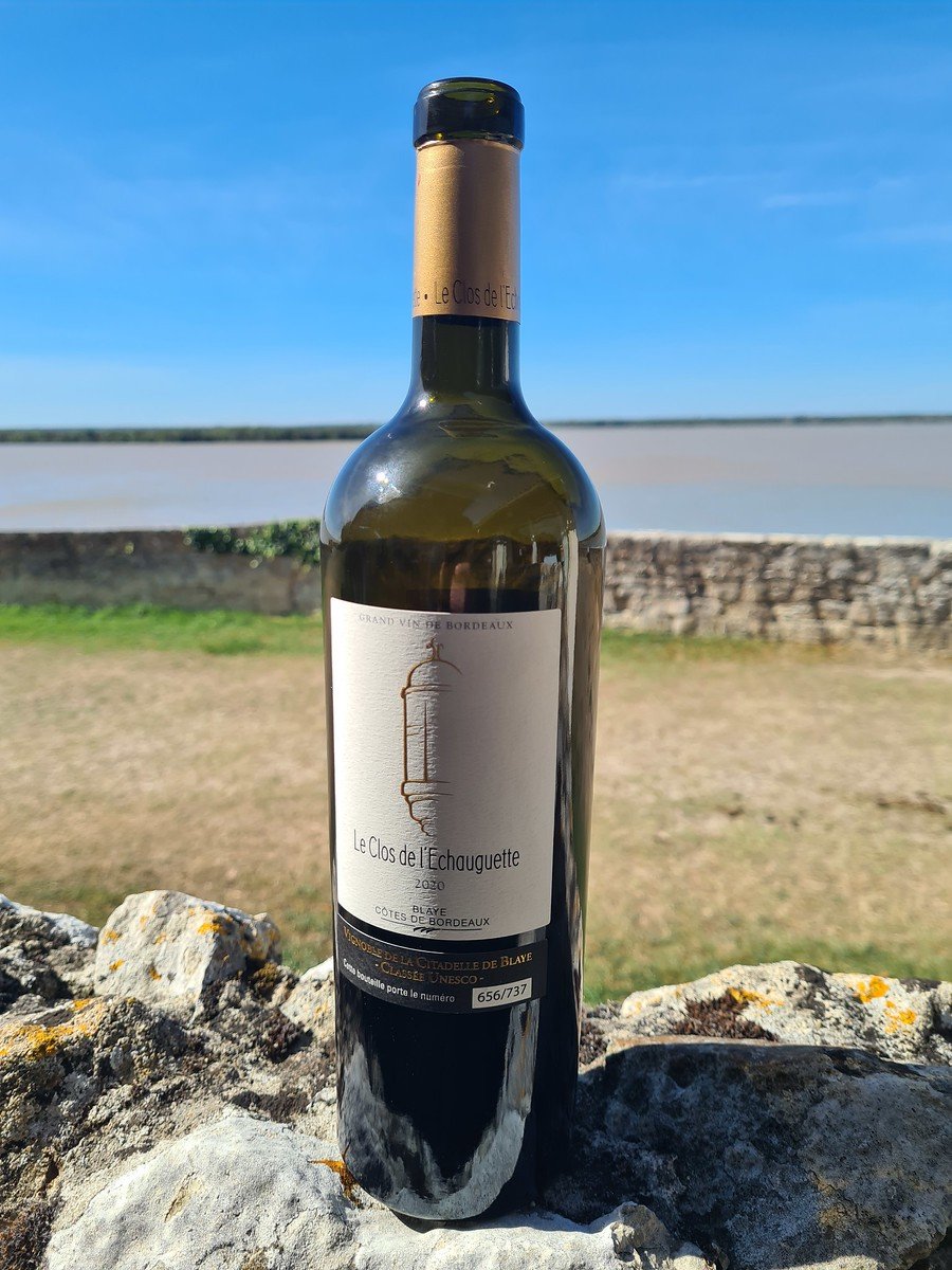Echaugette bottle with view.jpg