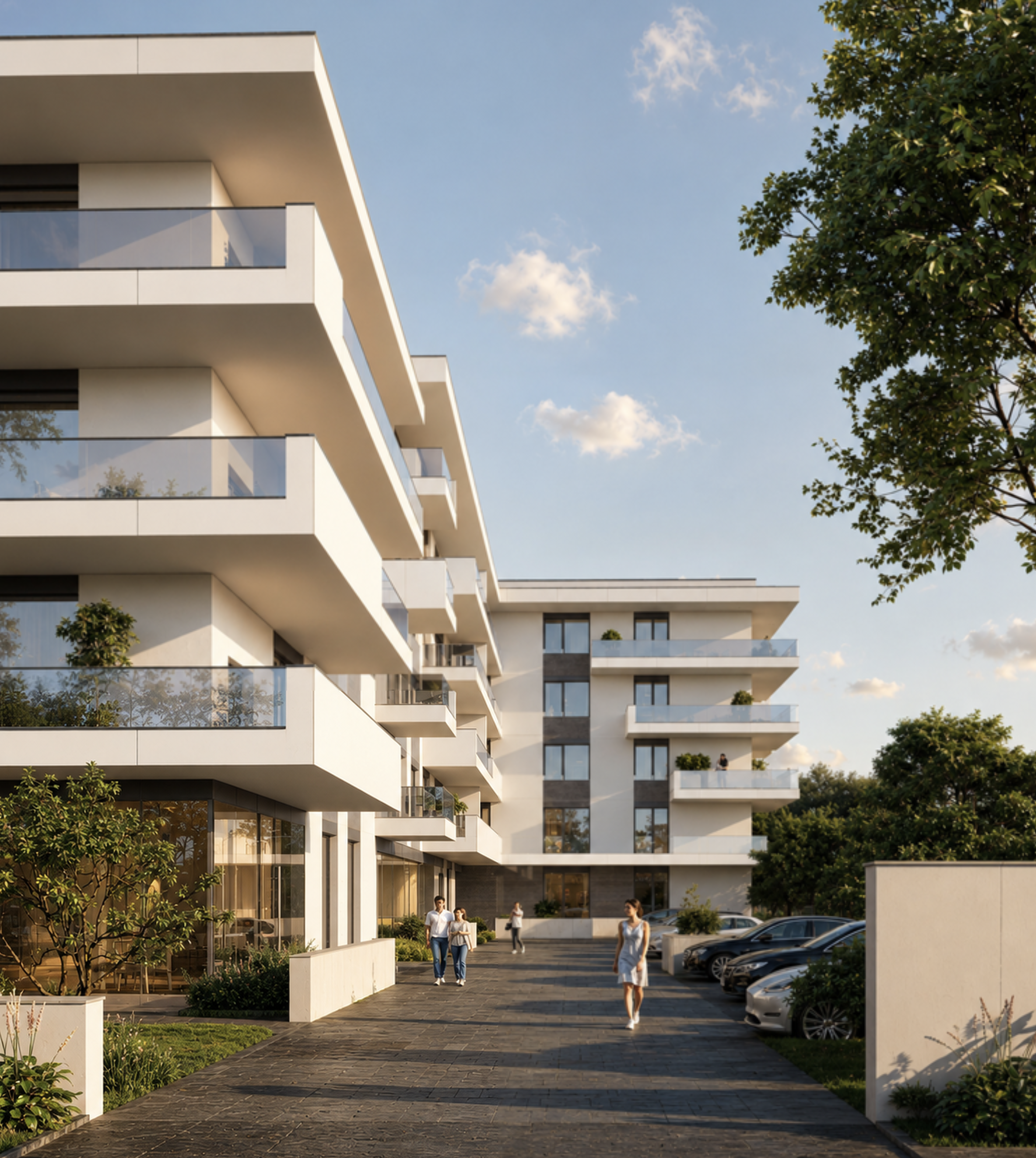 Modern multi-story residential building with balconies and large glass windows, surrounded by greenery and parking lot, with a clear blue sky and a few clouds.