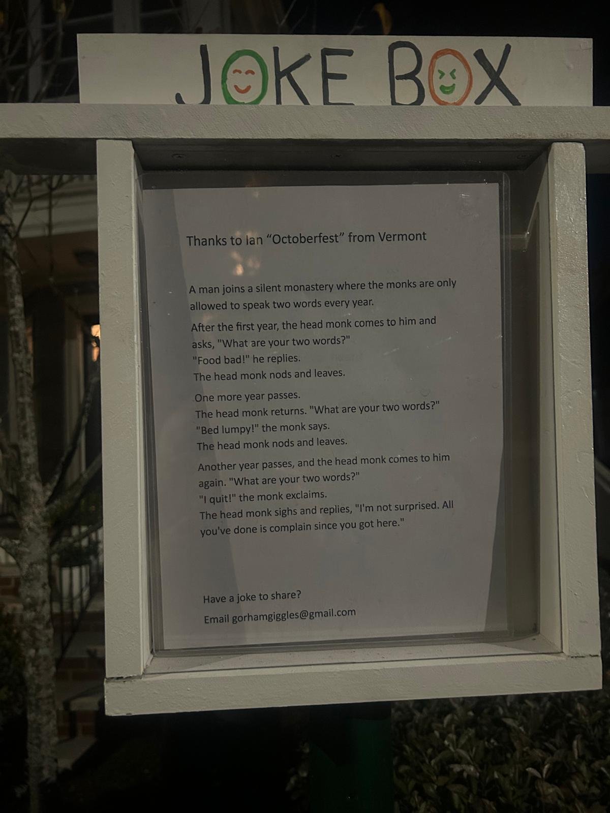 Signboard with a story joke about a monk and two words, attributed to Ian 'Octoberfest' from Vermont. The sign has a White background with black text.