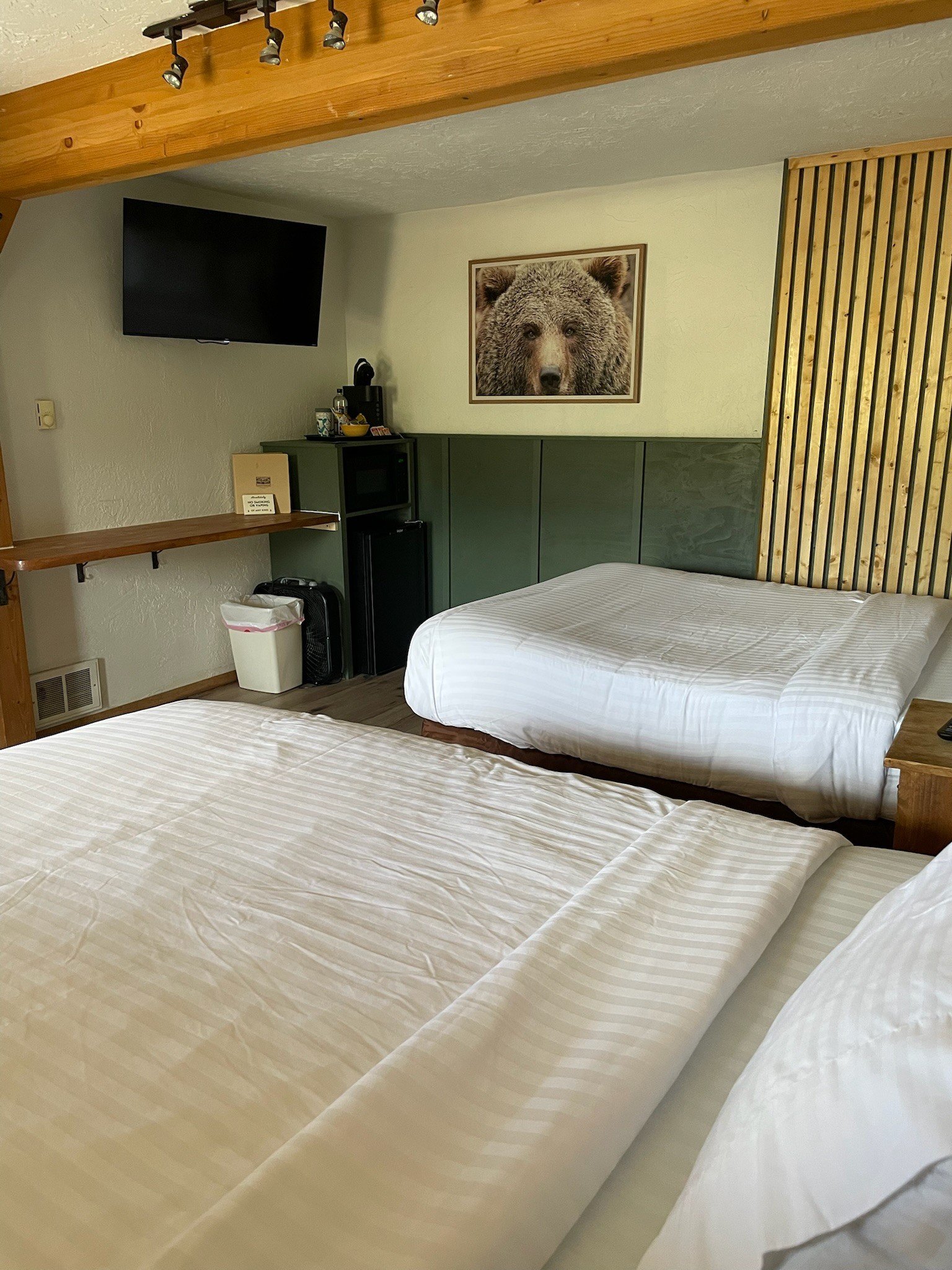 Uniquely designed hotel room at The Spruce Lodge with no two rooms alike - giving boutique vibes without the boutique price.