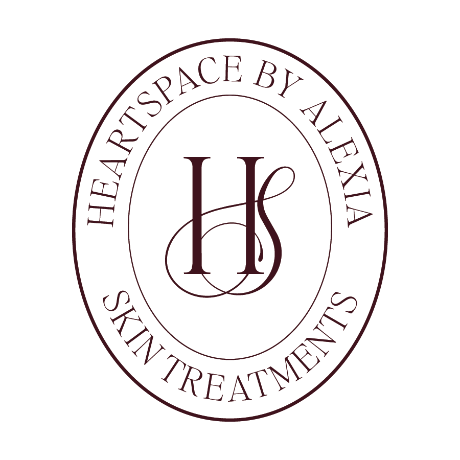 Logo for Heartspace by Aleka Skin Treatments featuring a monogram H and S in the center surrounded by a circular text reading 'Heartspace by Aleka Skin Treatments'