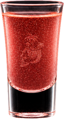 A clear glass filled with a red, fizzy beverage, likely soda or sparkling juice, showing bubbles rising to the top. The Easy Inn Kansas Citys best kept secret underground dive bar serving great bar food with a staff that makes this place unforgettabl