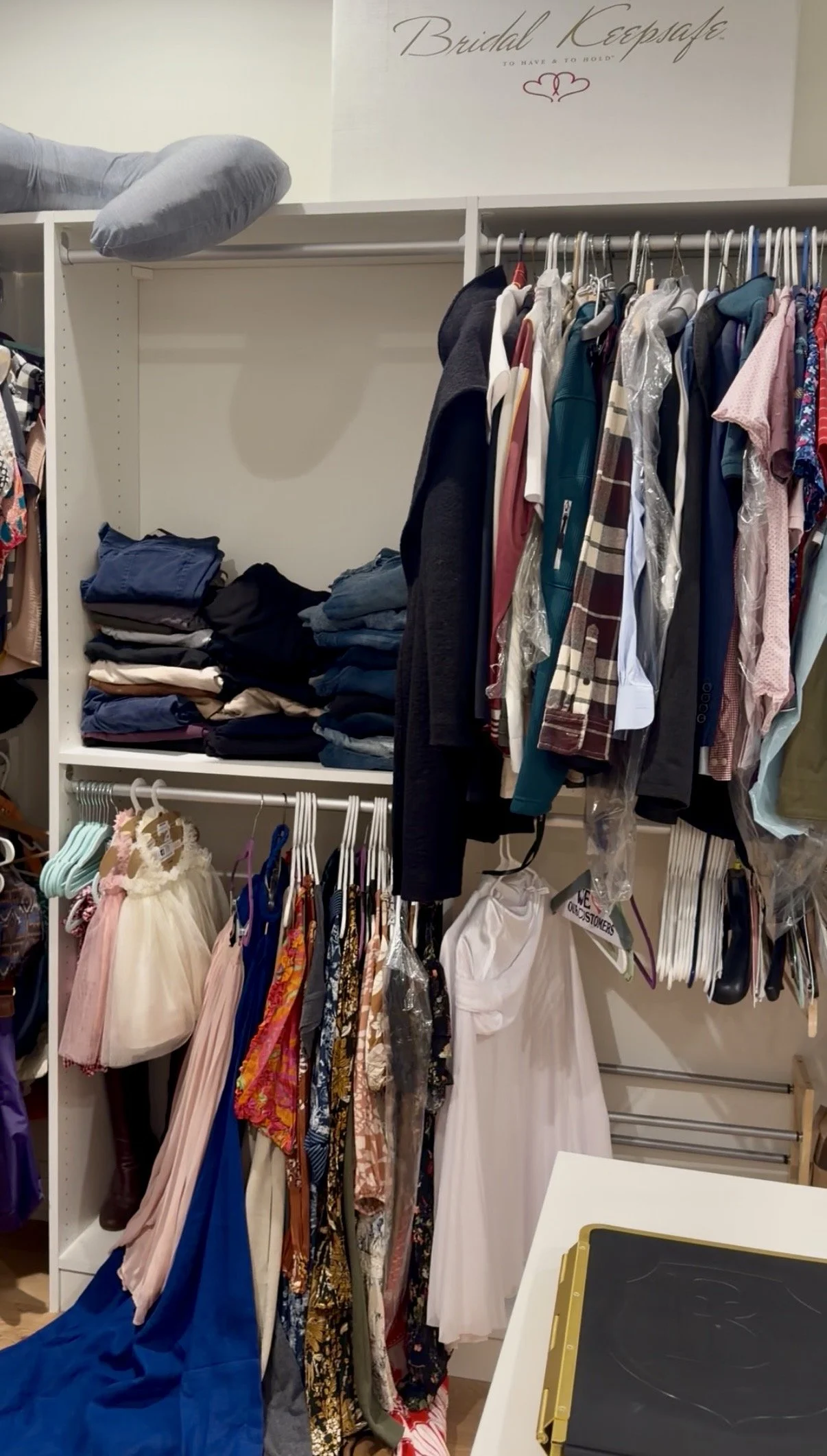 Closet organization transformation showing hanging clothing, folded wardrobe items, and storage zones created for a cleaner, more functional closet