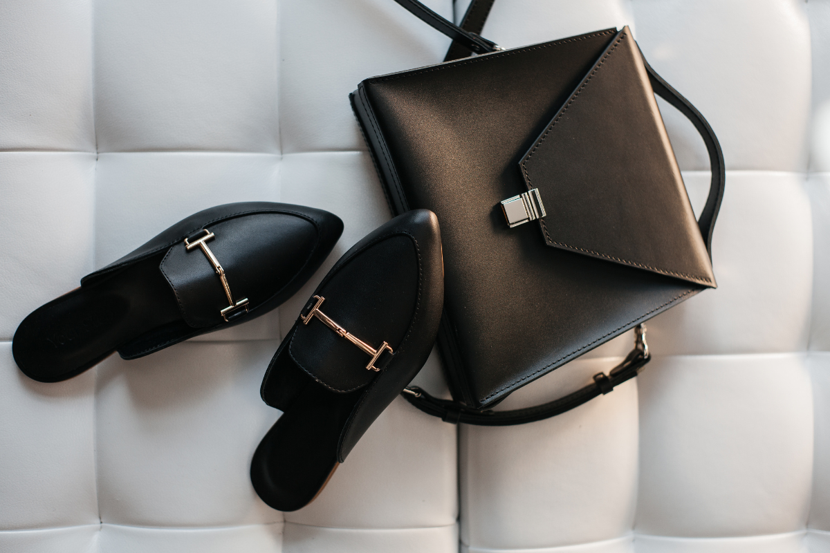 Designer shoes, handbag, and clutch representing resale management for fashion, accessories, and high-value unwanted items.