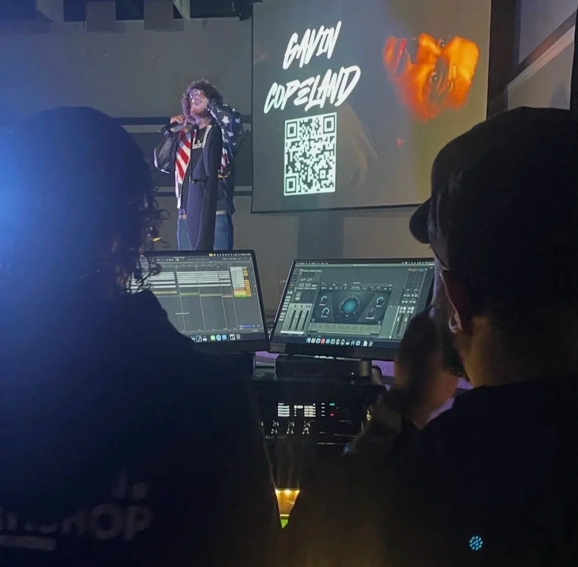 Gavin Copeland Concert, playback systems and vocal processing sitting backstage
