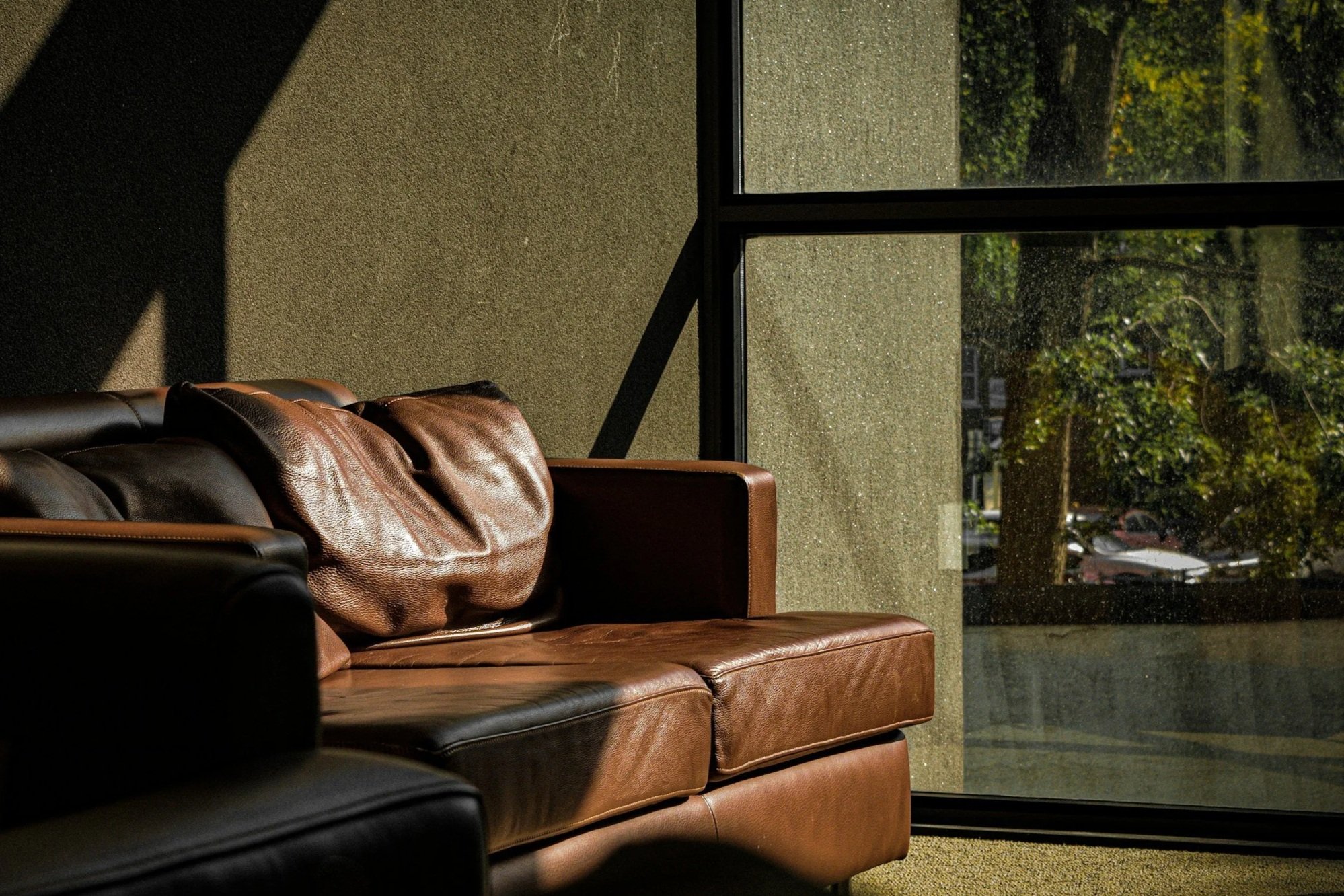 Image of a couch representing online therapy for therapist burnout, secondary trauma, emotional exhaustion,and compassion fatigue