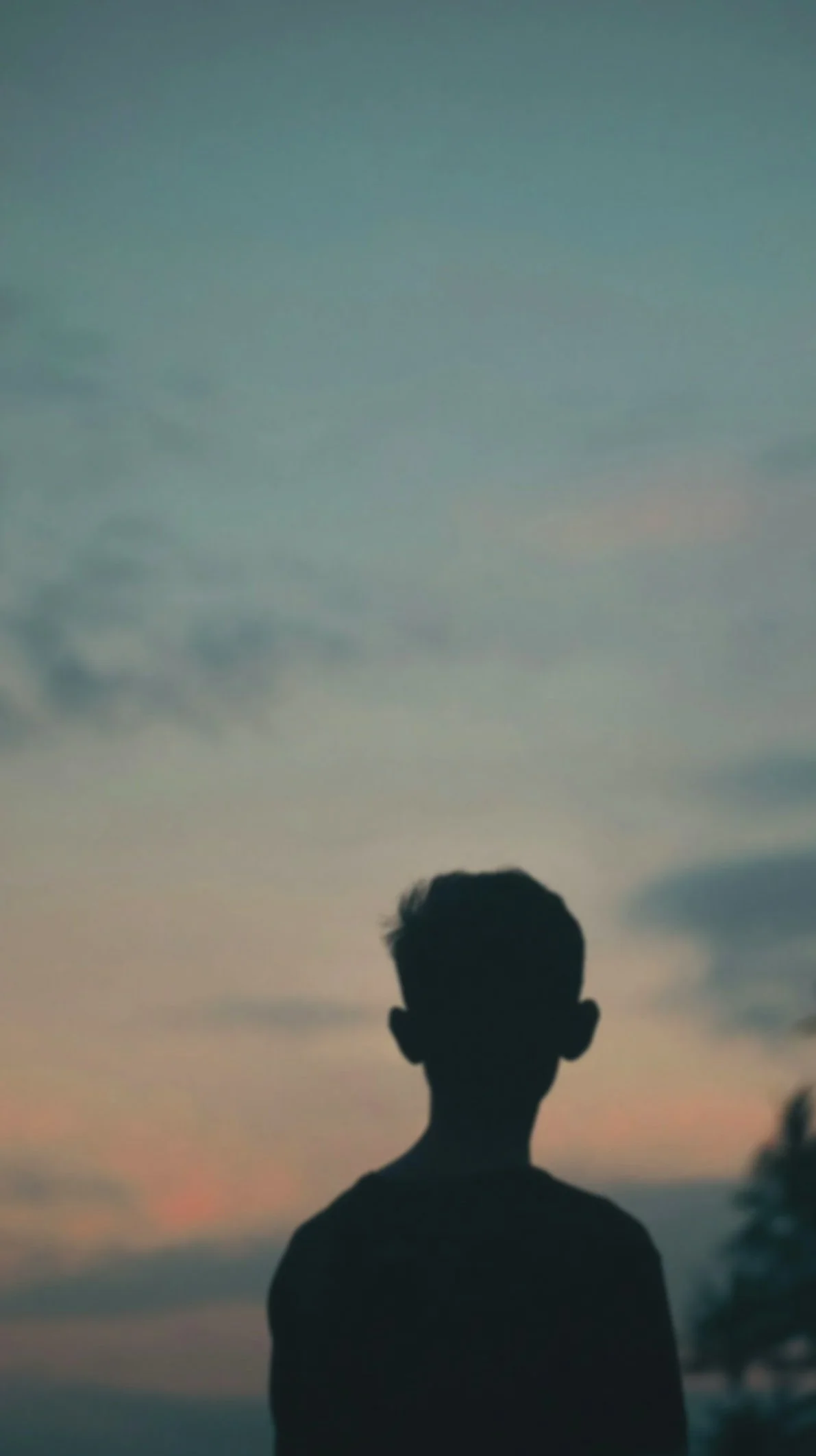 Silhouette of man representing body image healing, self-esteem growth, and emotional well-being