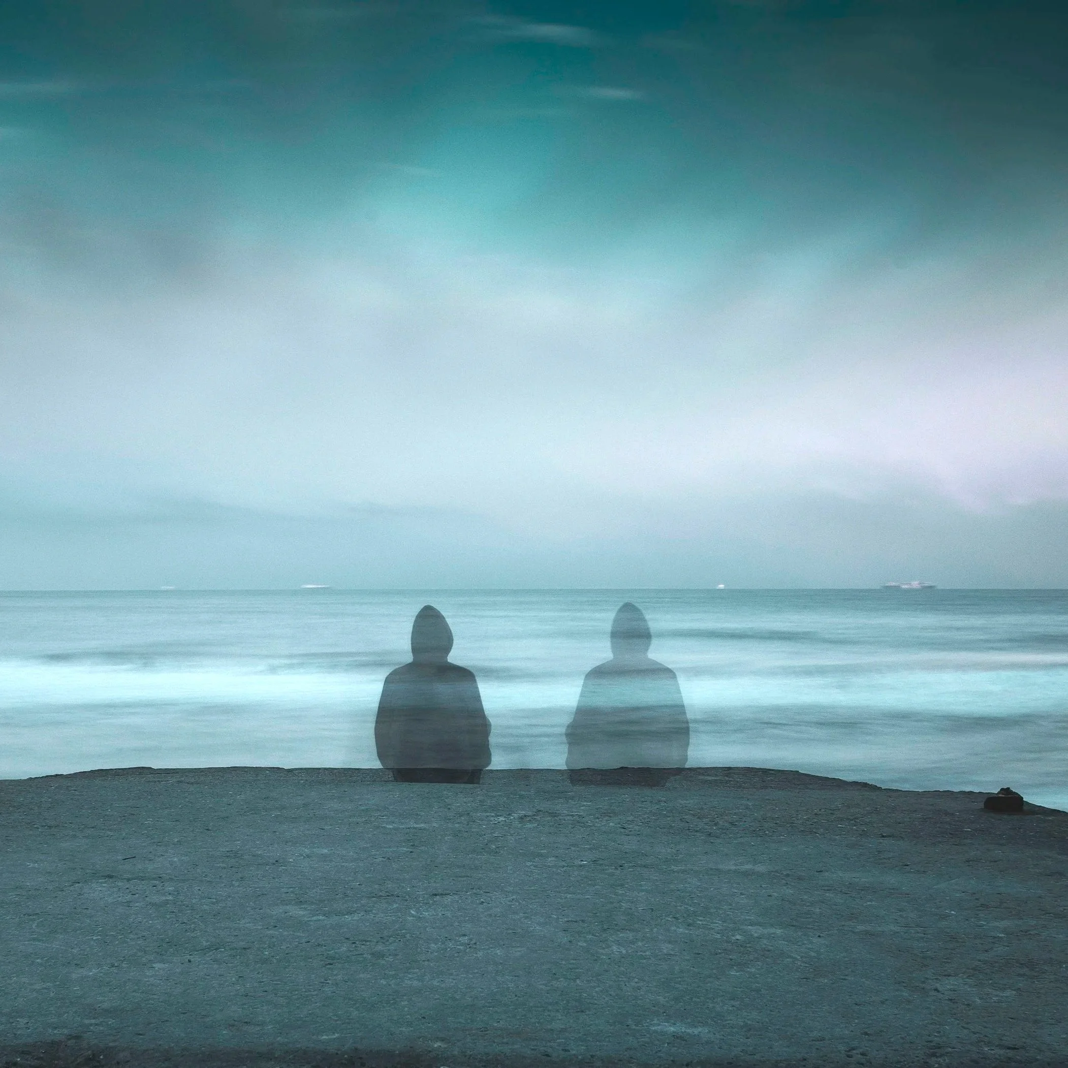 Image of a person and their shadow on the beach, representing the way depression therapy can help individuals to not feel alone
