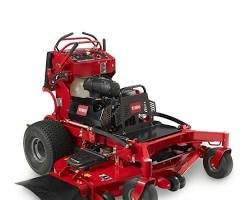 Red commercial zero-turn riding lawn mower with black engine and large rear tires