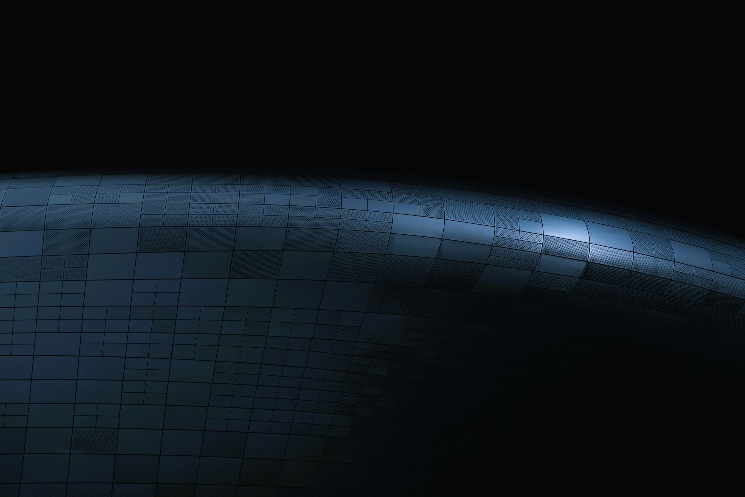 Blue-toned business architecture image representing advisory services and organizational risk