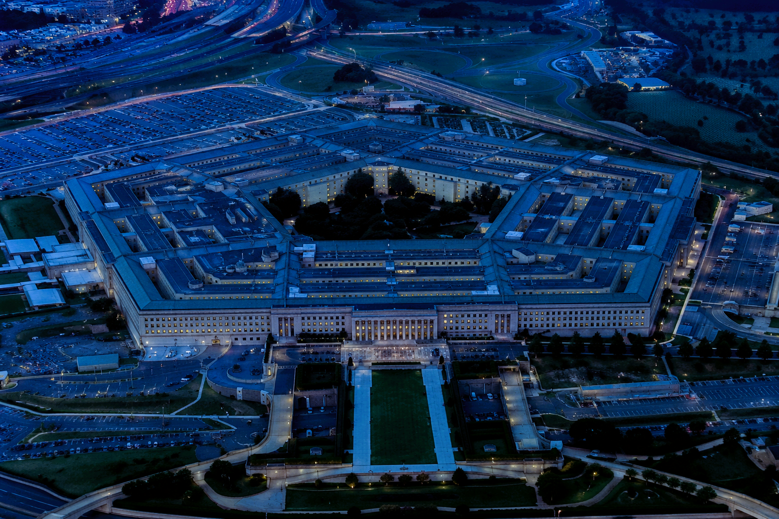 Blue-toned Pentagon image representing cleared-industry and national security contractor support.