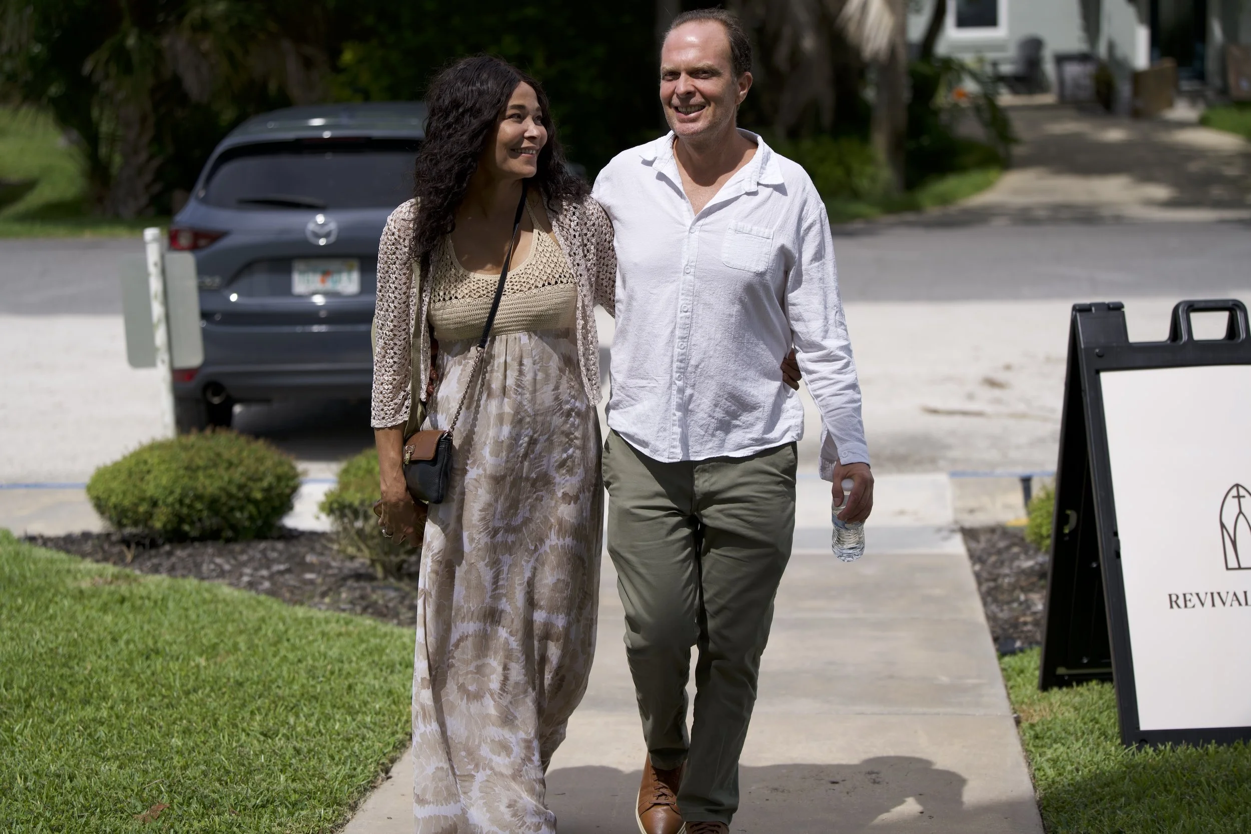 Couple walking into church at Revival House