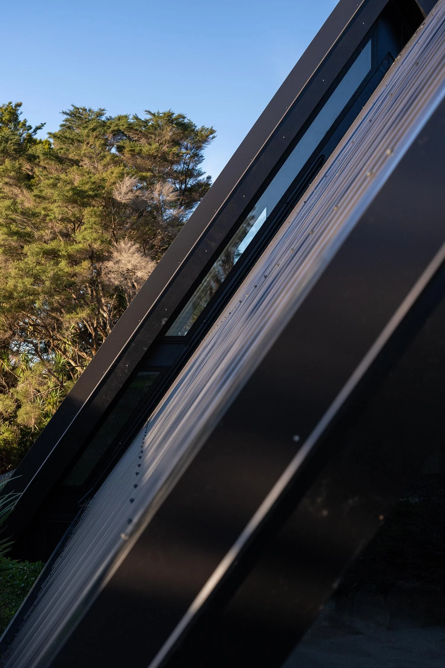 Close up of a modern new build A-frame house in Auckland.