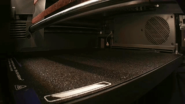 Time lapse of a 3D printer showing the print bed printing lavender tract holders.