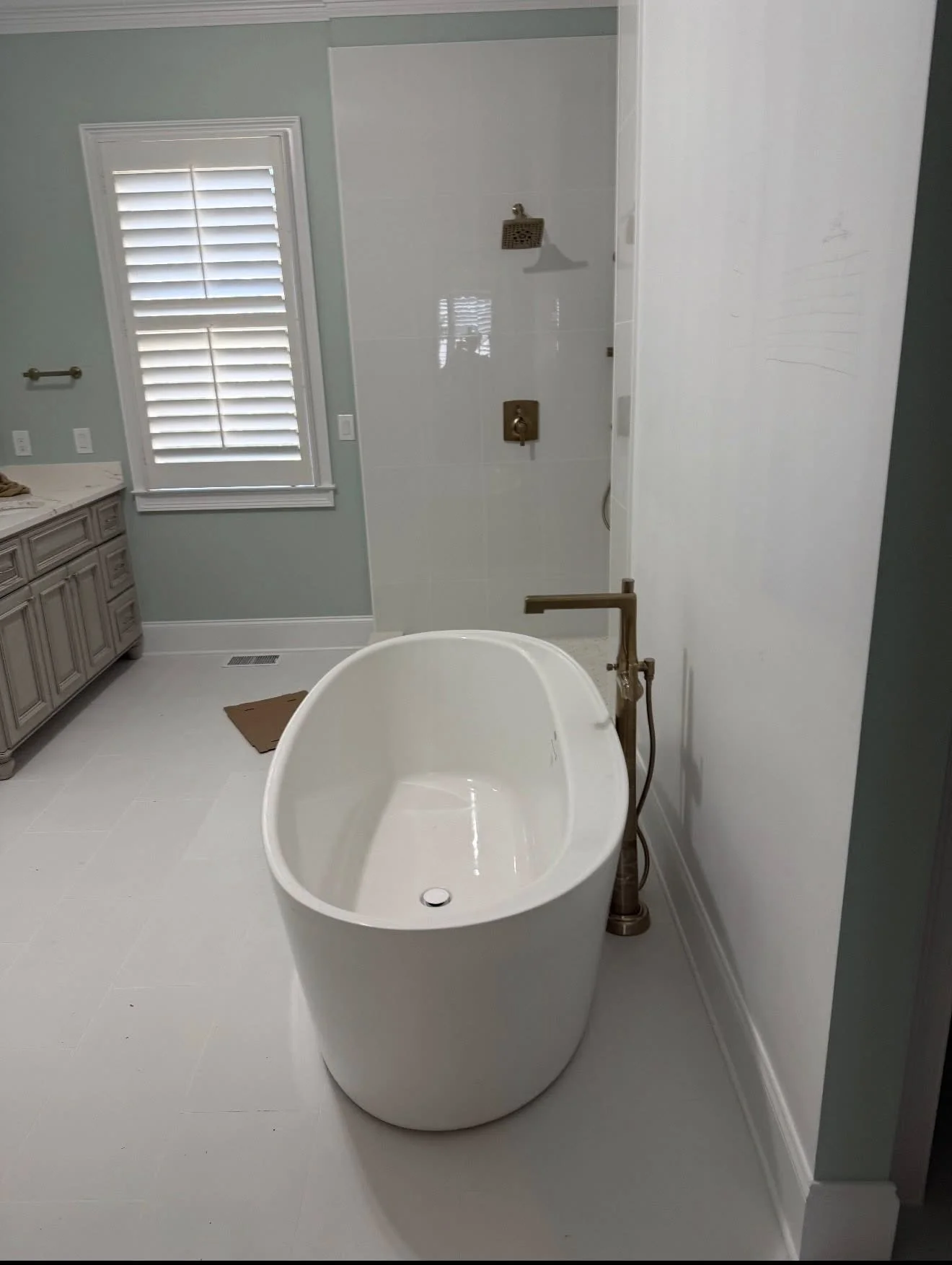 Modern bathroom with freestanding bathtub and shower
