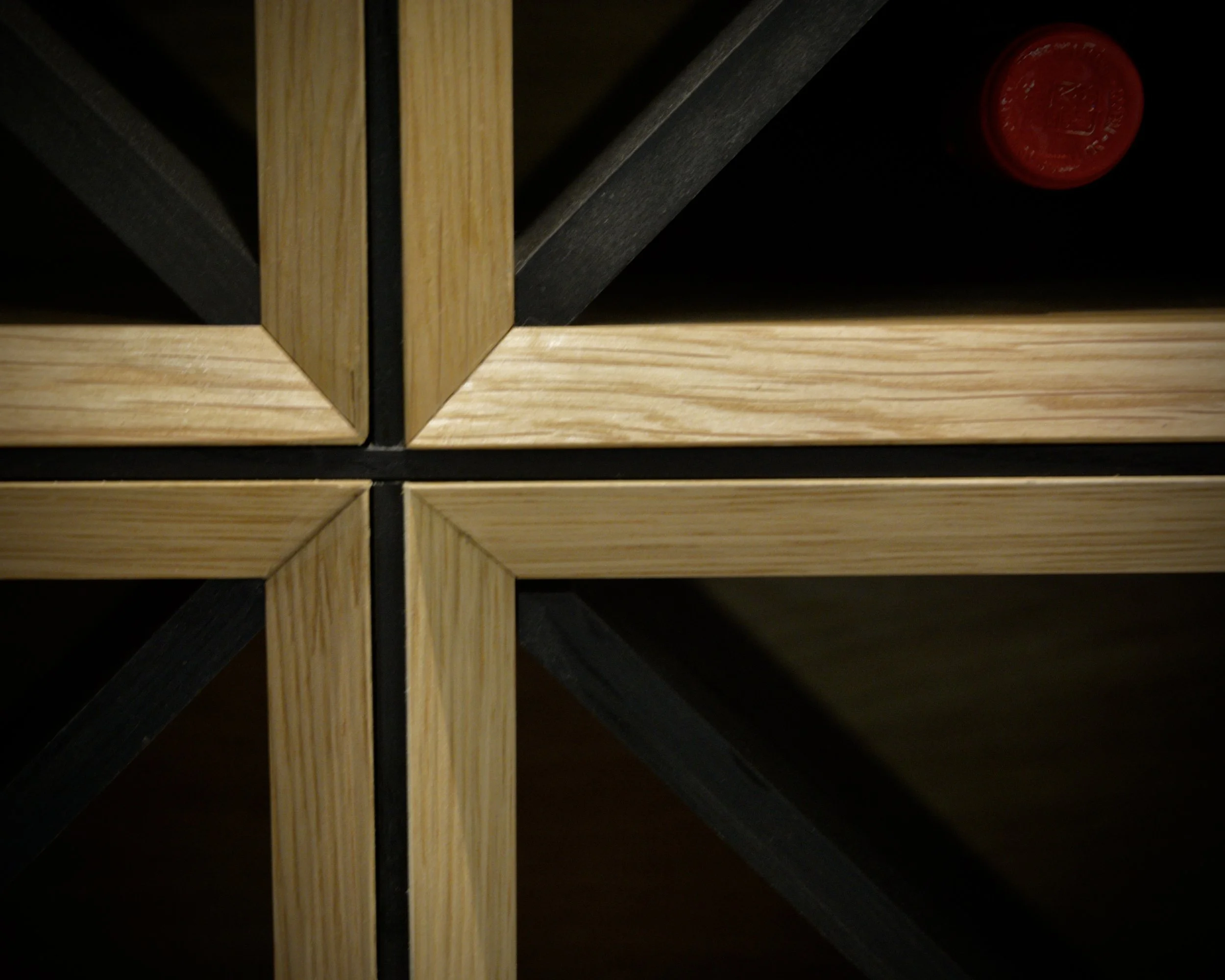 Bespoke oak wine cellar detail — handcrafted joinery by Solum Bespoke