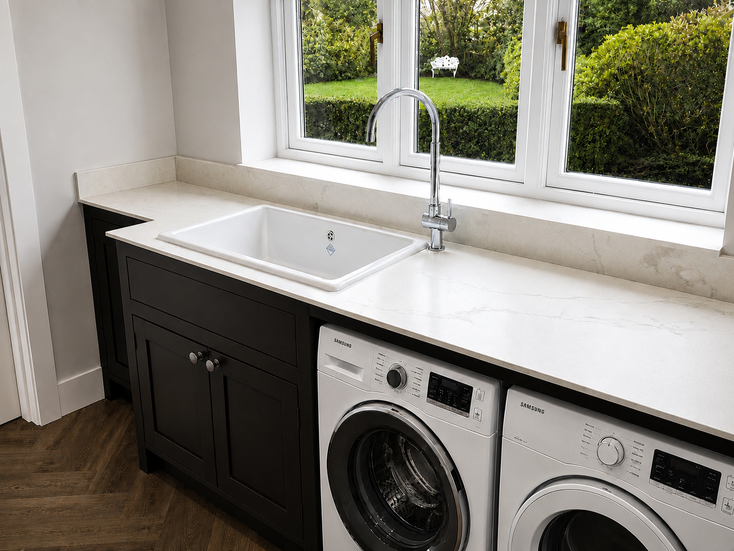 Bespoke joinery flowing from the kitchen to the Laundry and Pantry space