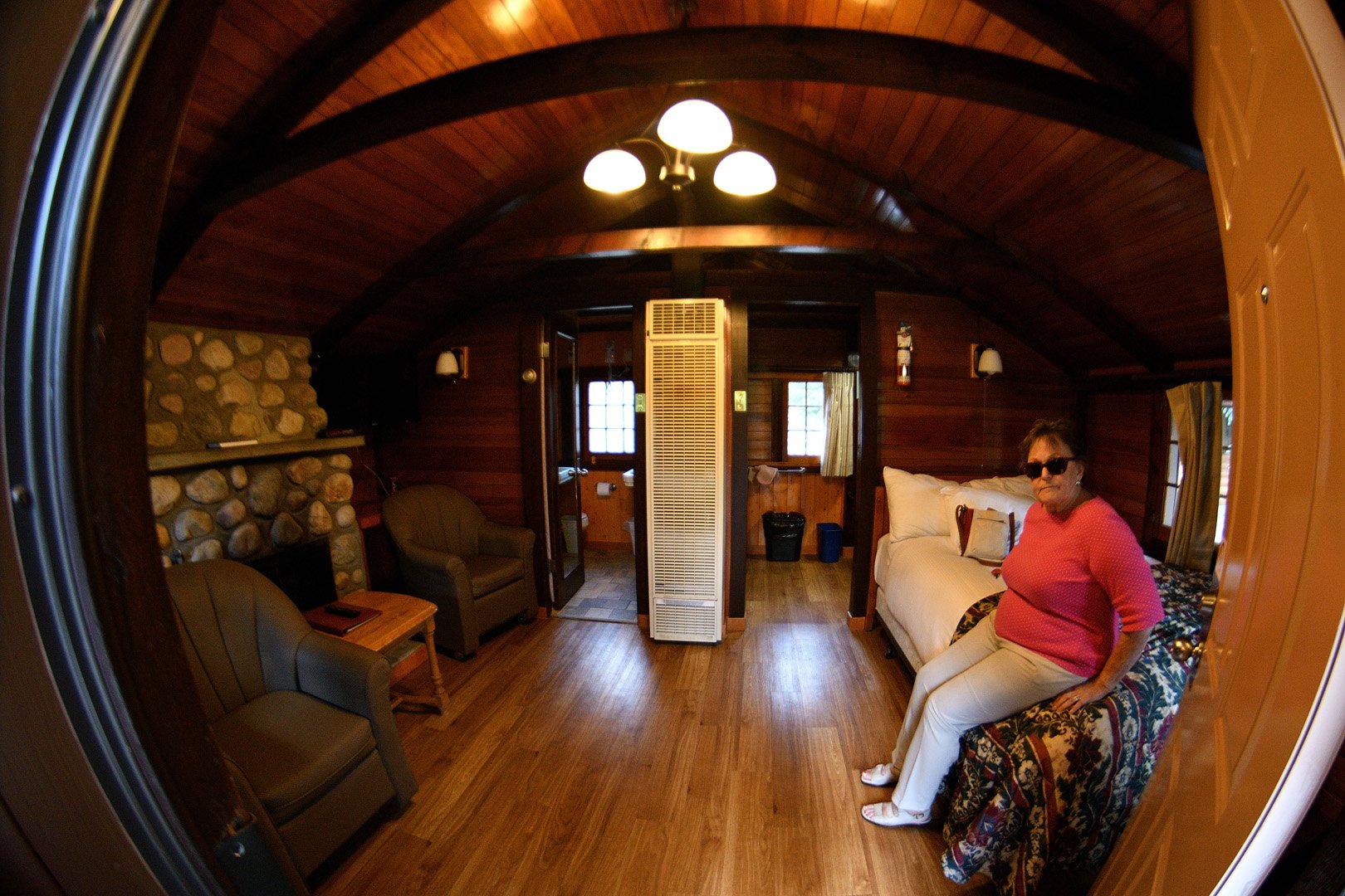 mom on her bed in our chalet
