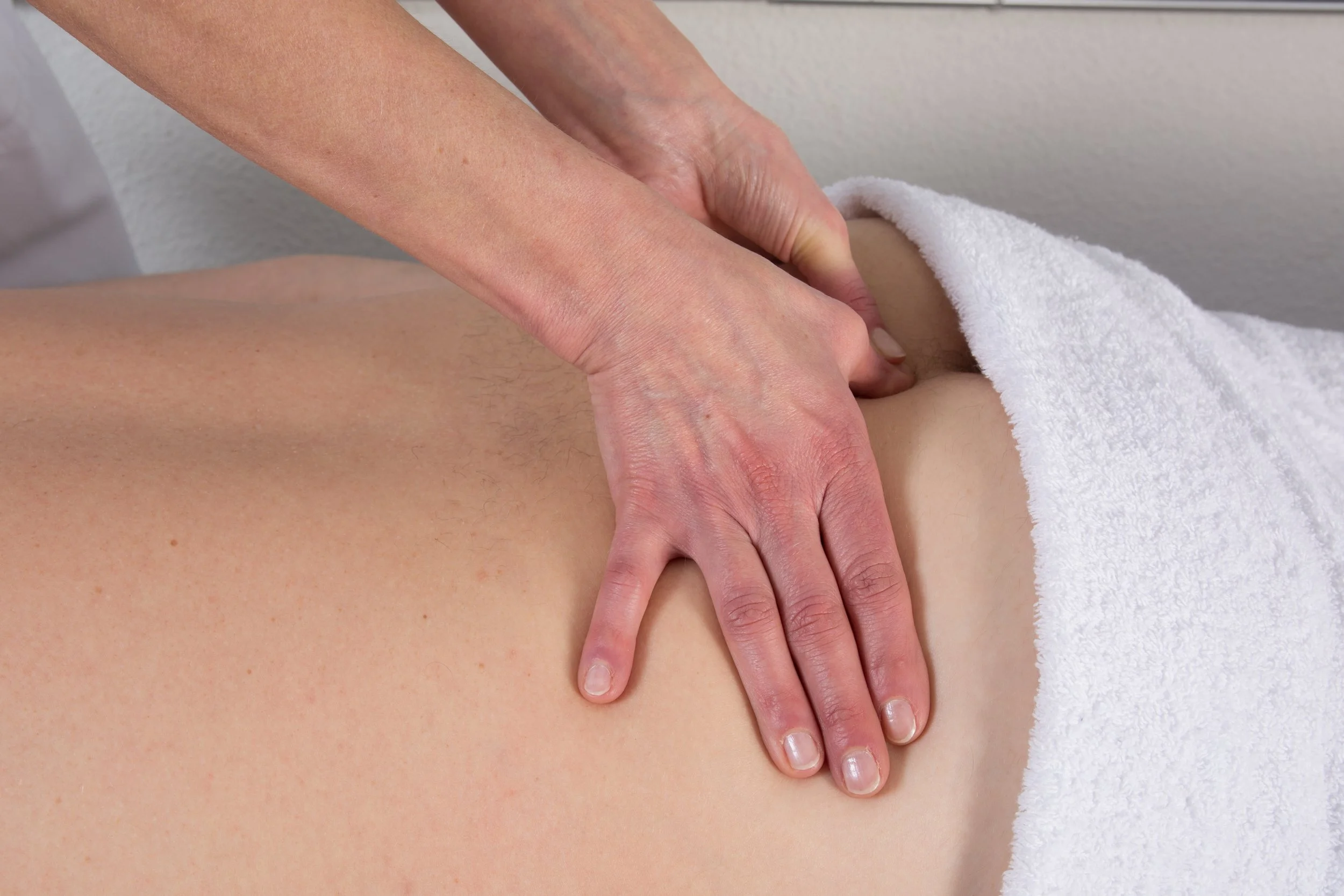 tuina massage back pain tension discomfort on the back