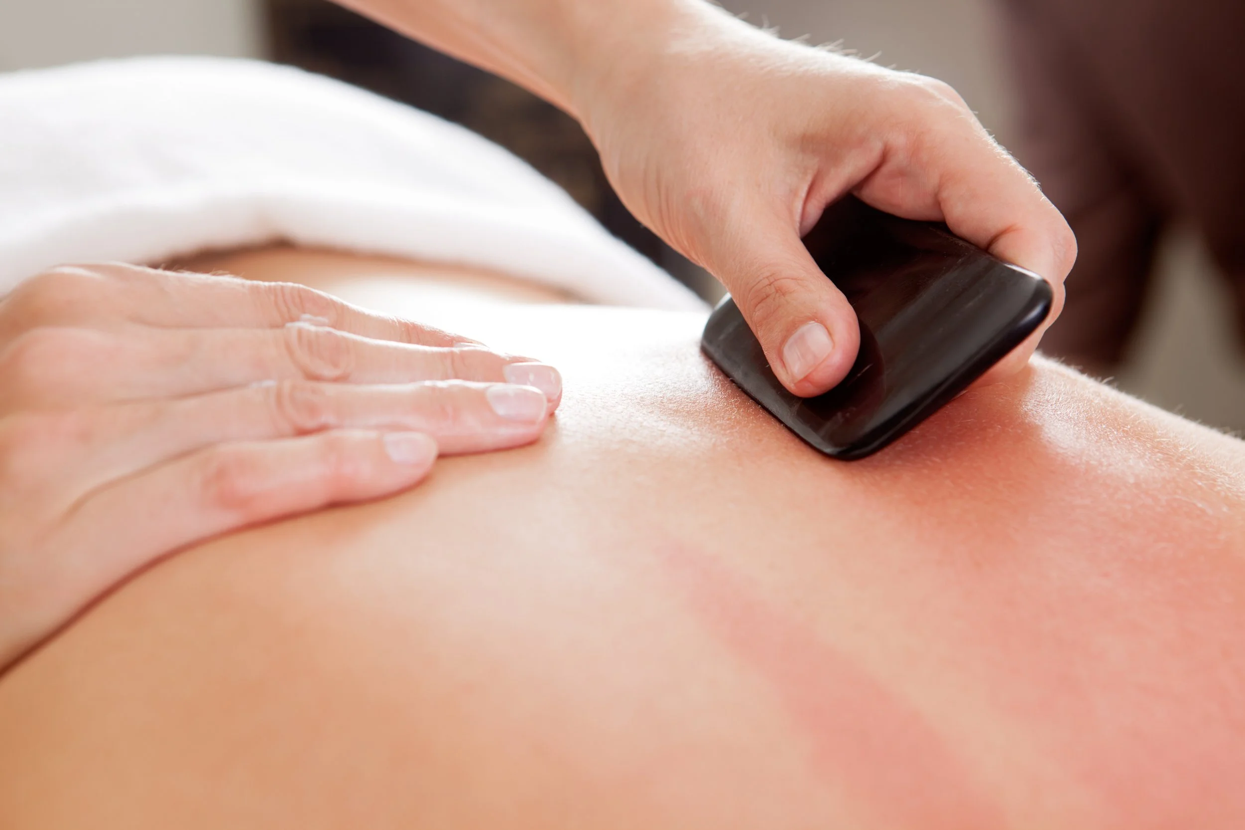 gua sha against inflammation fever flu heaviness dampness Qi flow