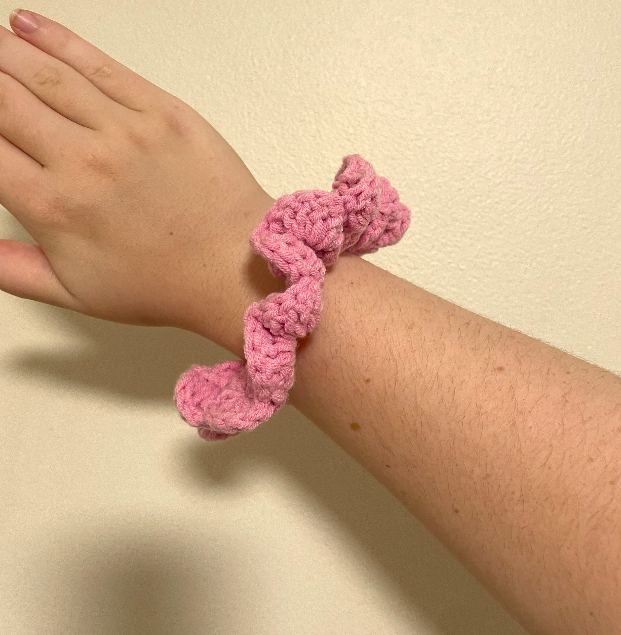 Pink scunchie on arm.jpg