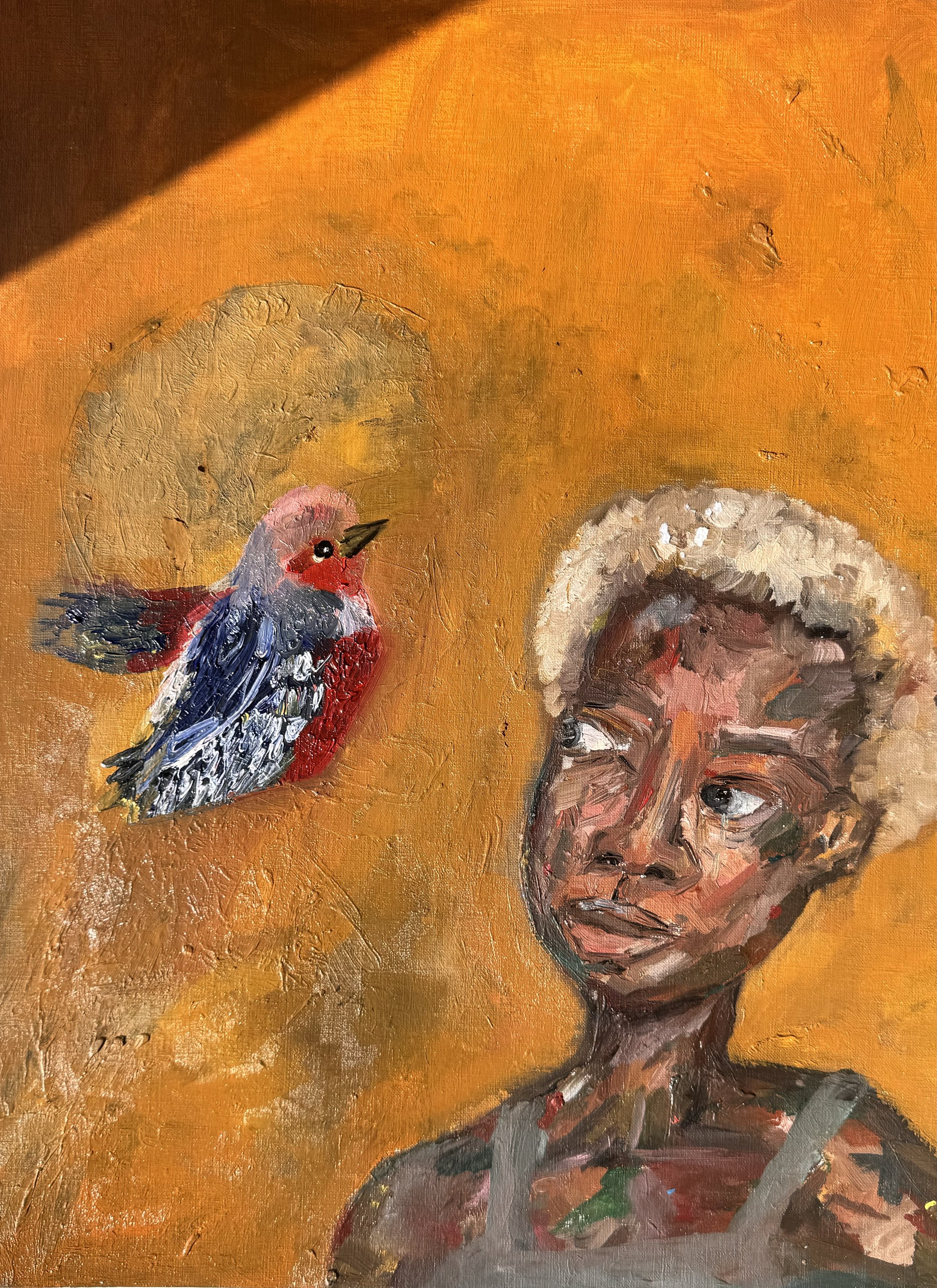 An oil painting of a young person with short blonde hair against an orange background, with a colorful bird perched nearby.