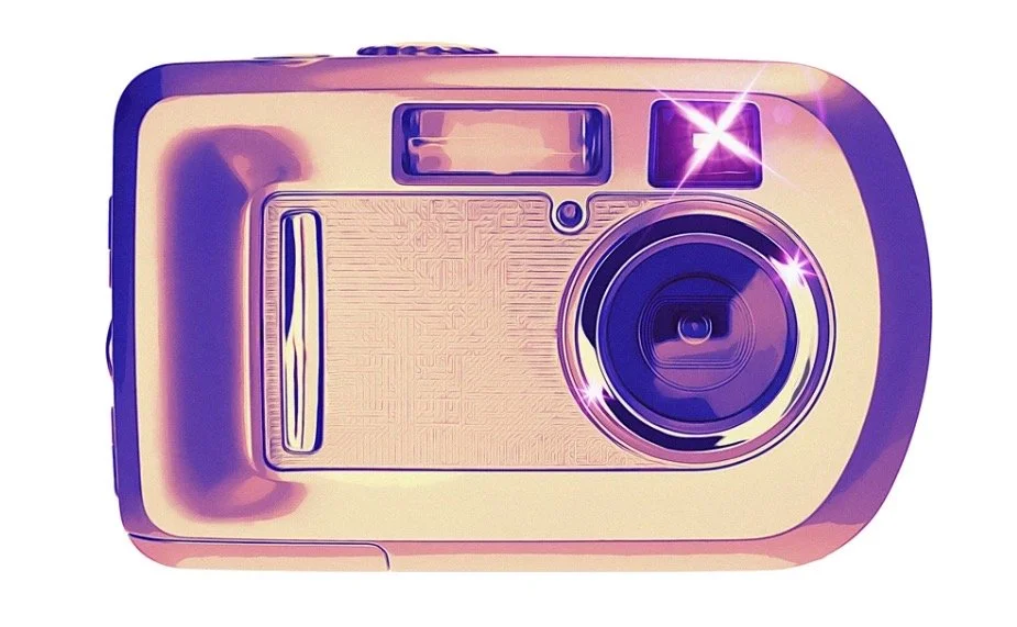 A vintage instant camera with a pink and purple color scheme, featuring a large lens, a flash, and a viewfinder, illustrated with shiny highlights.