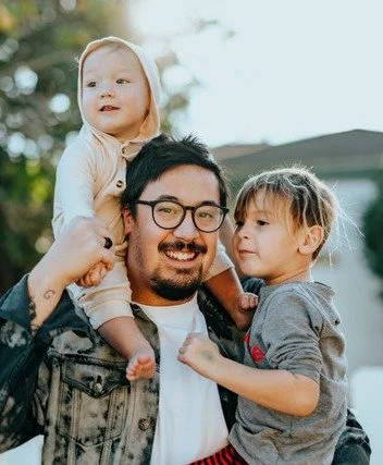 Single father happy due to family therapy with his family of orgin