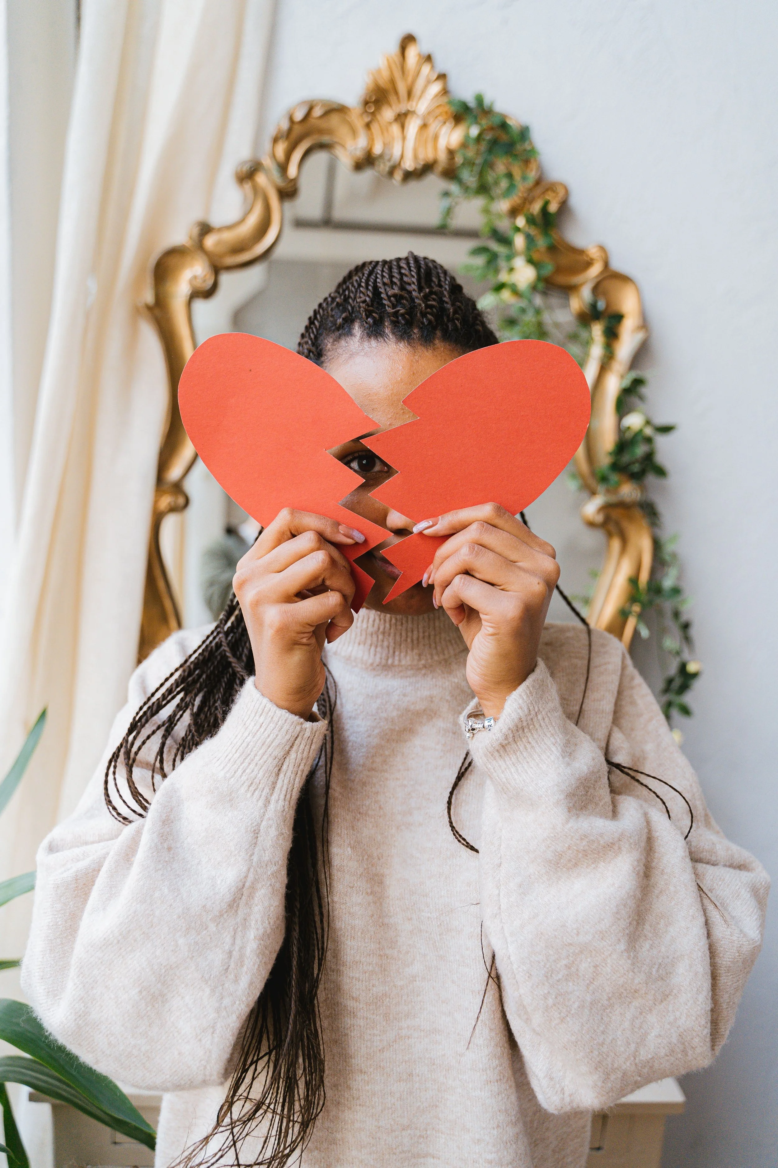 woman representing a broken heart that can be fixed after EMDR