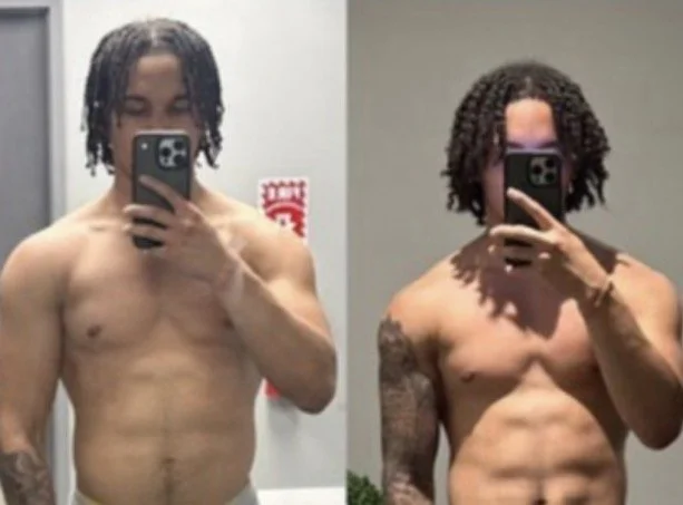 Male taking picture in mirror to show physical body changes as a result of nutrition and fitness coaching