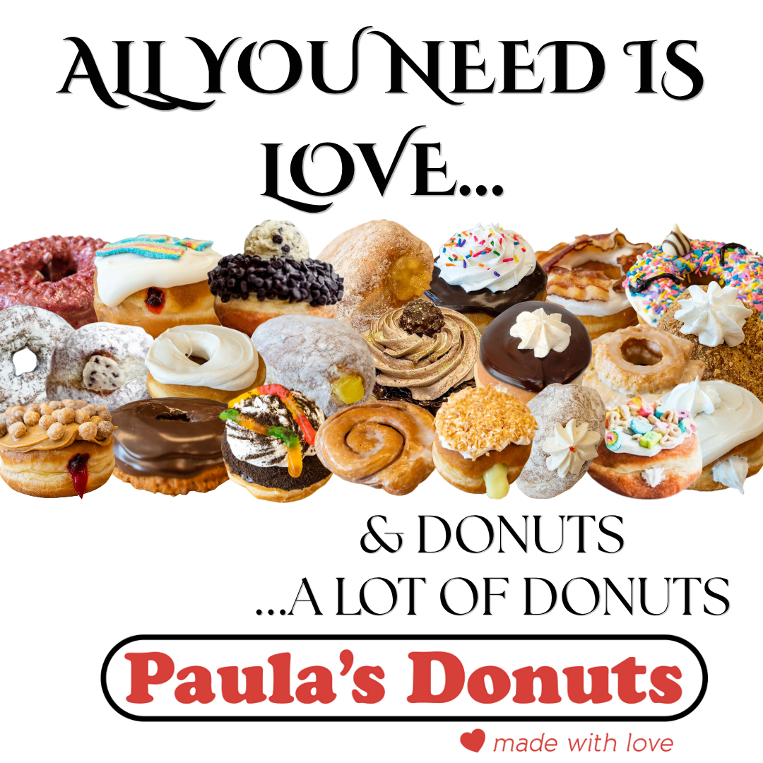 A variety of donuts with colorful toppings and glazes, displayed in a line. Text above reads 'All you need is love...' and at the bottom, a sign says 'Paula's Donuts' with a small heart and the phrase 'made with love'.
