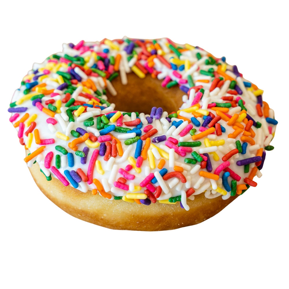 A close-up of a colorful sprinkled donut with white icing.