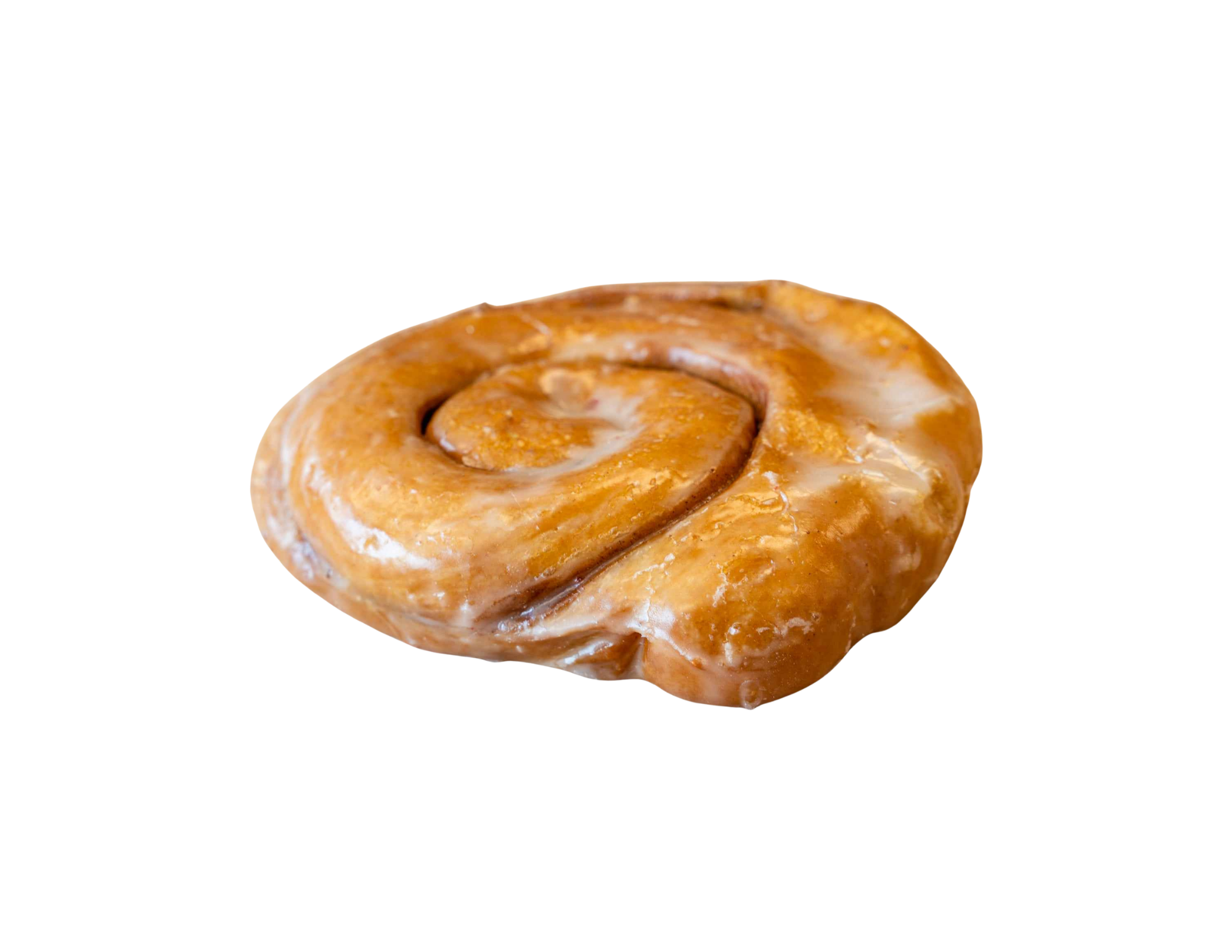 Close-up of a cinnamon roll with icing on top.